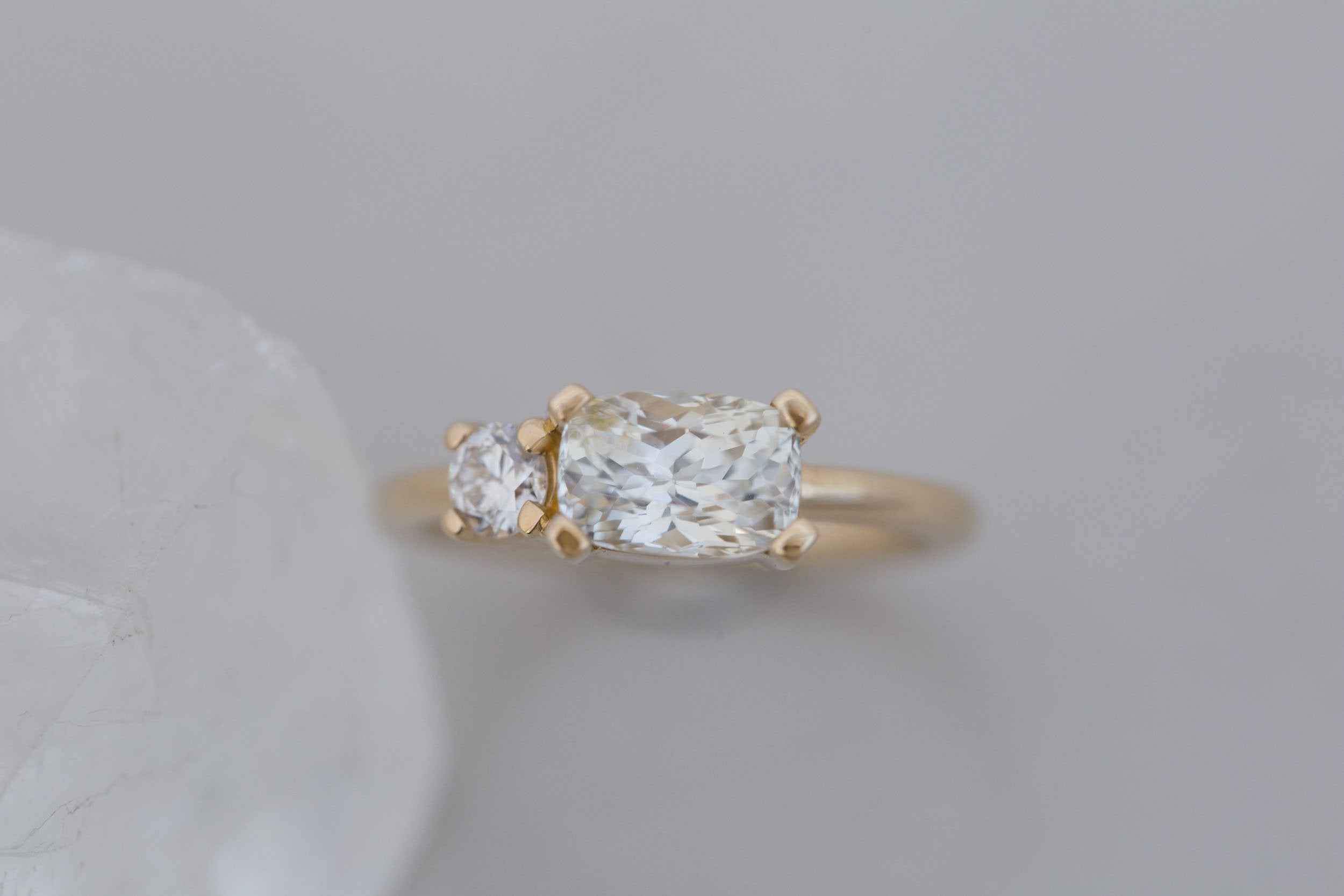 Liana Ring | Elongated Cushion Cut White Sapphire 2.12 ct + Old European Cut Diamond Engagement Ring | 14k Recycled Gold | One of a Kind