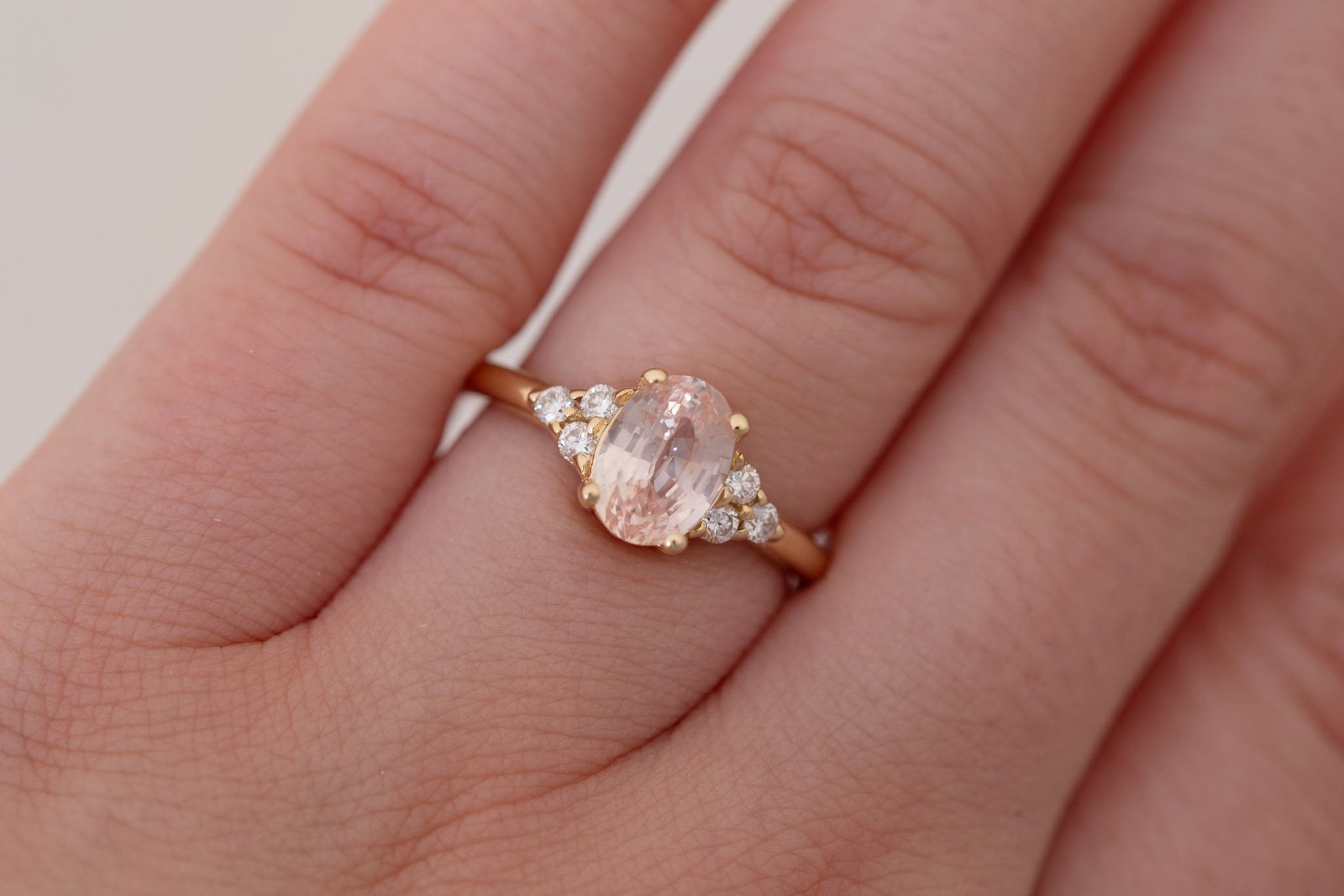 Verona Ring | Peach Oval Sapphire + Round Diamond Accents Engagement Ring 2.17 ct | 14k Recycled Gold | One of a Kind