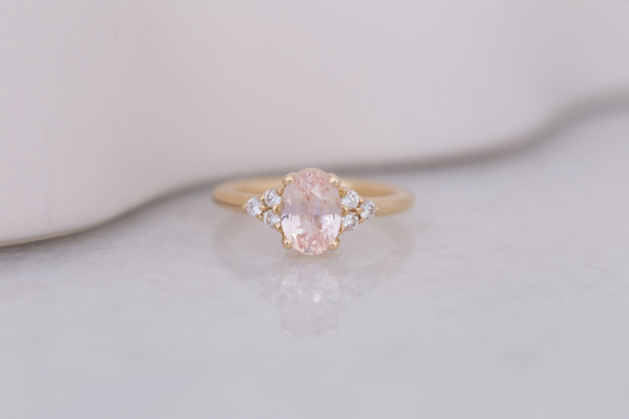 Verona Ring | Peach Oval Sapphire + Round Diamond Accents Engagement Ring 2.17 ct | 14k Recycled Gold | One of a Kind