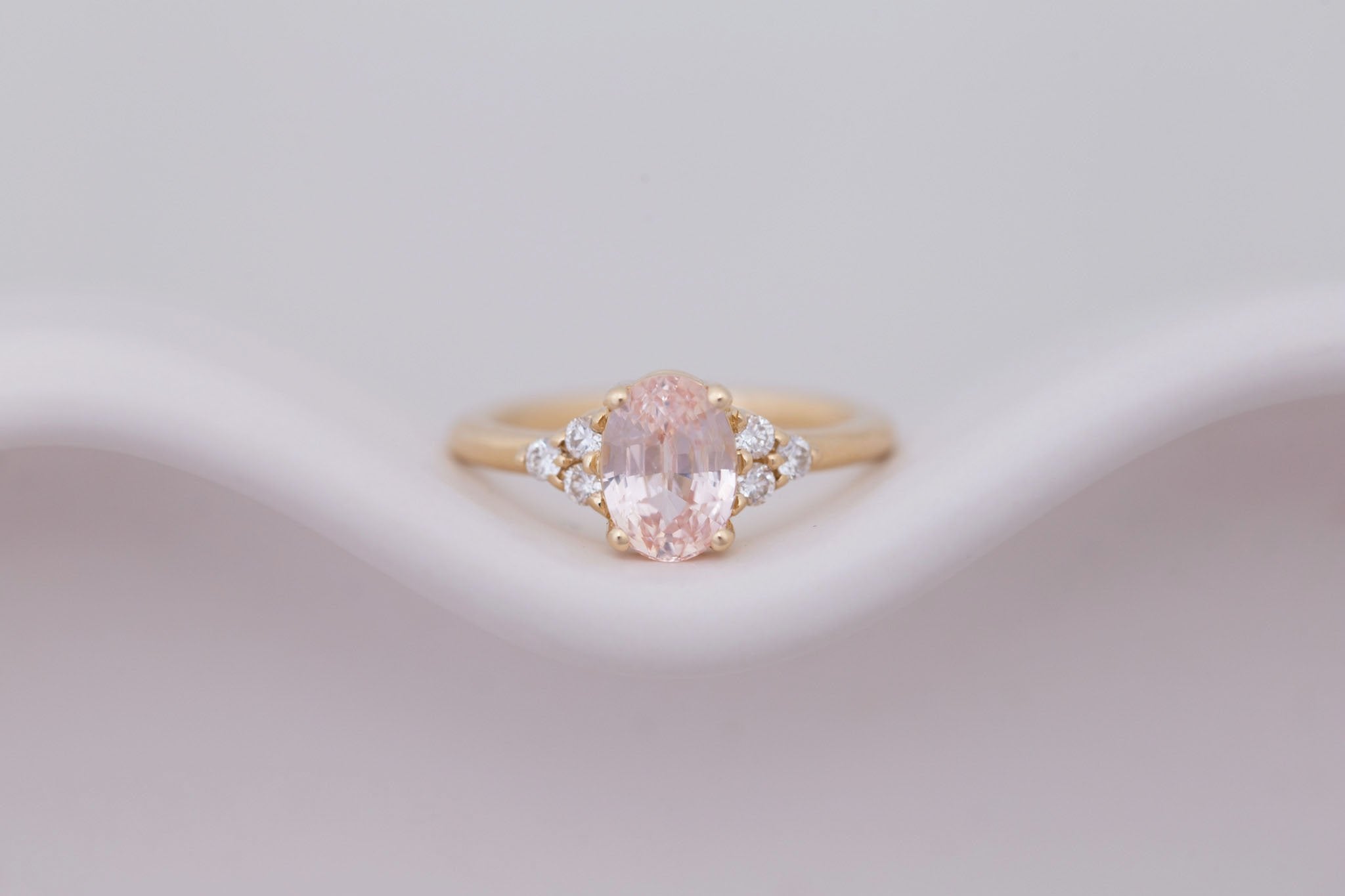 Verona Ring | Peach Oval Sapphire + Round Diamond Accents Engagement Ring 2.17 ct | 14k Recycled Gold | One of a Kind
