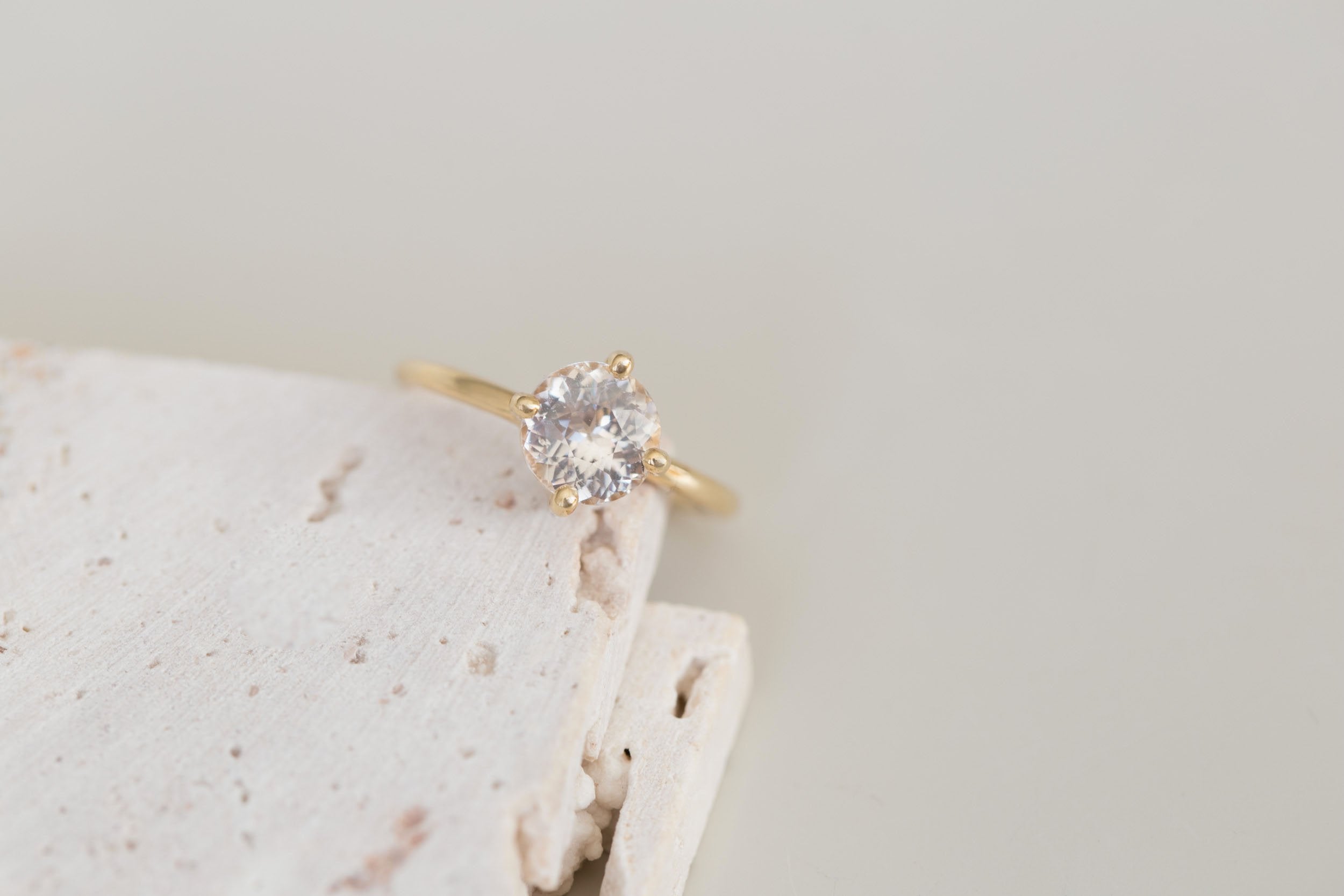 Leta Ring | Icy Blush Round Sapphire Compass Set Solitaire Engagement Ring 2.28 ct | 14k Recycled Gold | One of a Kind