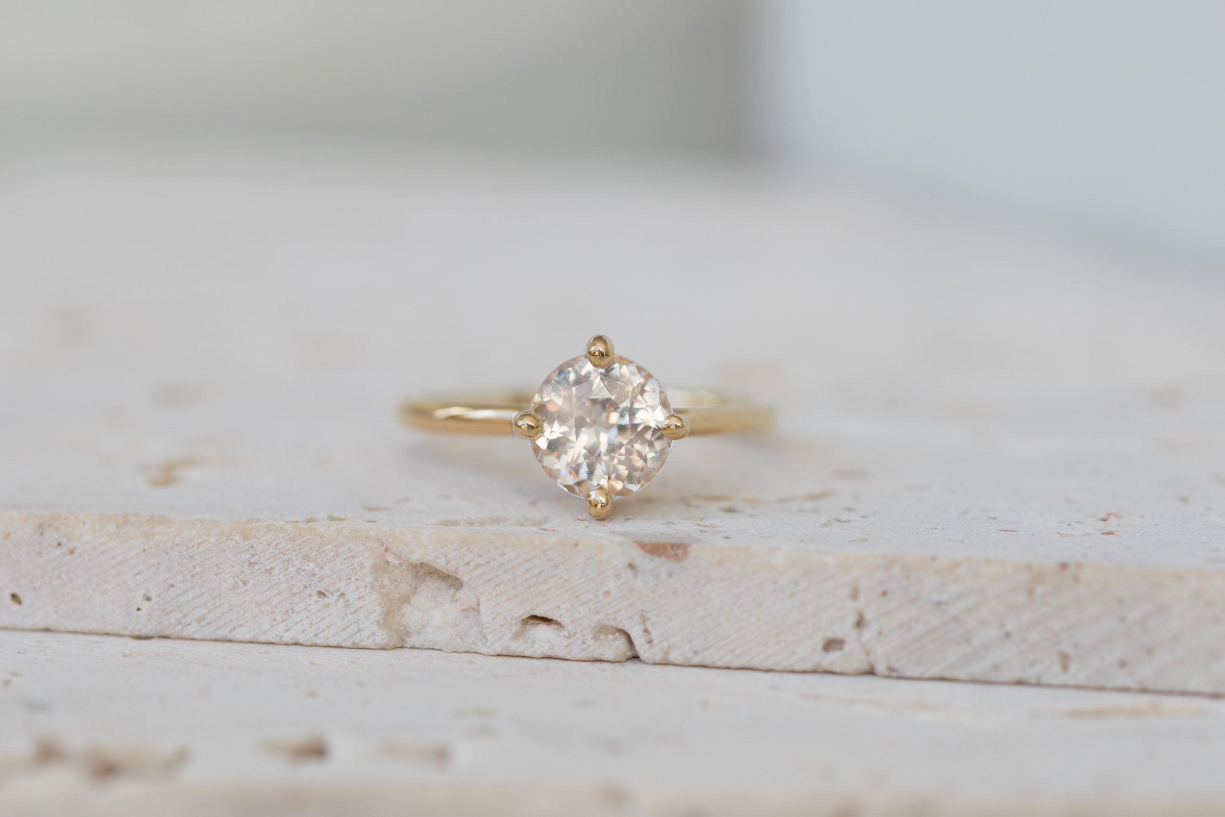 Leta Ring | Icy Blush Round Sapphire Compass Set Solitaire Engagement Ring 2.28 ct | 14k Recycled Gold | One of a Kind
