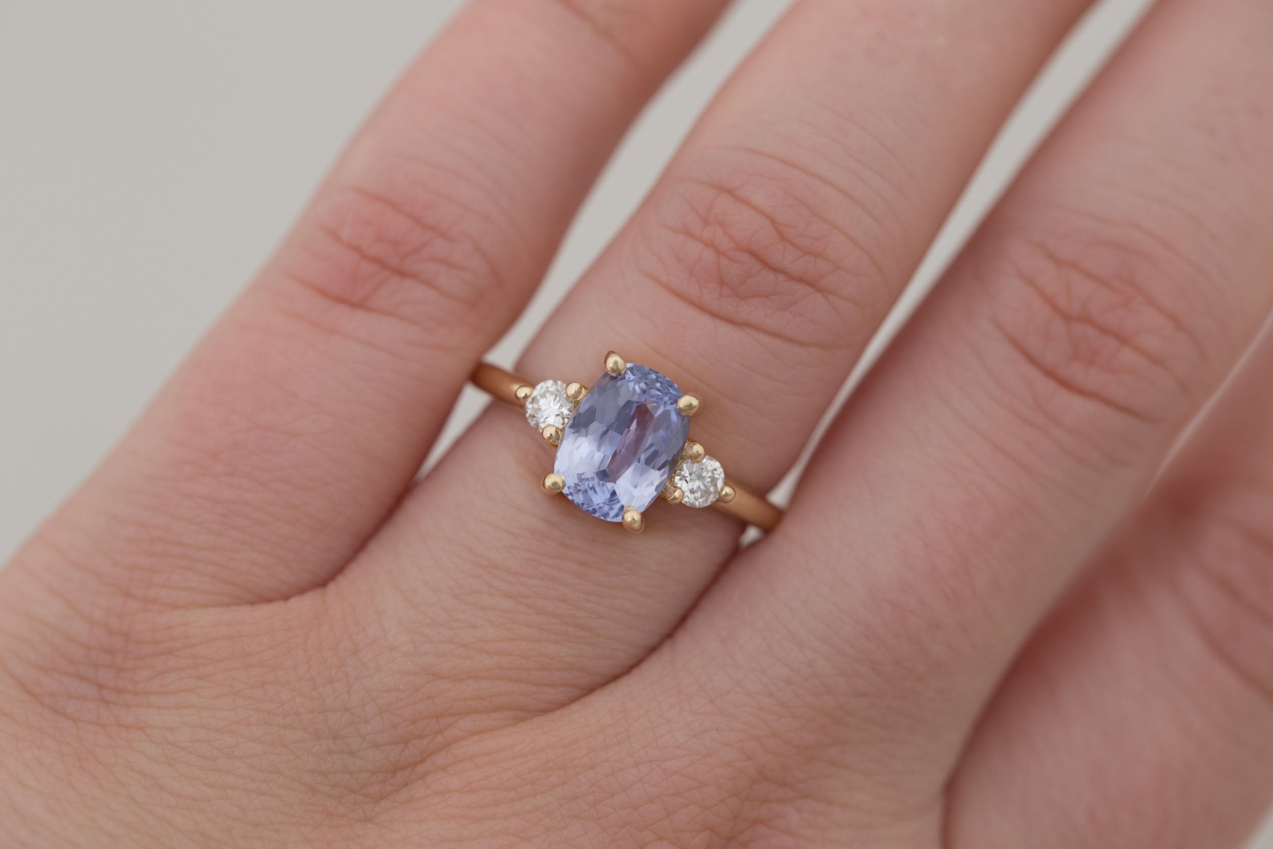 Maeve Ring | Lavender Cushion Sapphire + Round Diamond Accent Engagement Ring 2.34 ct | 14k Recycled Gold | One of a Kind