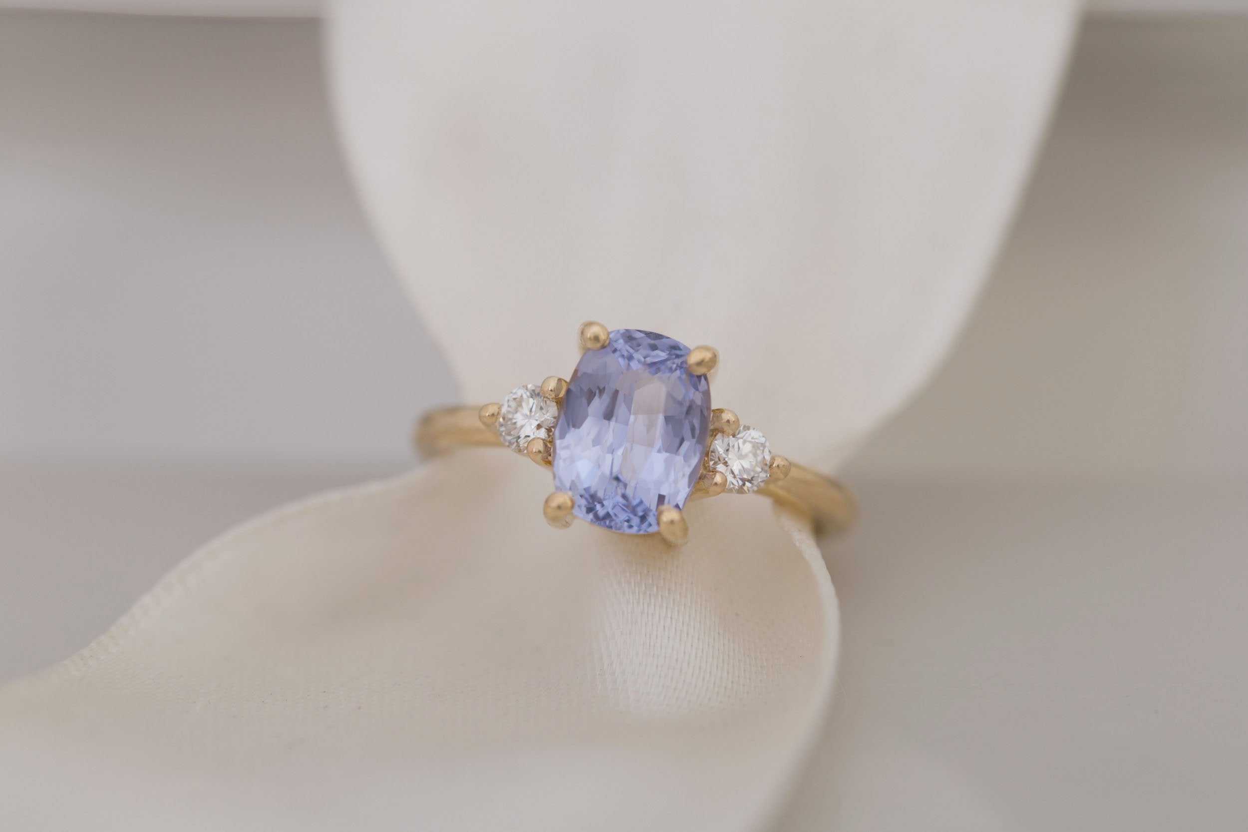 Maeve Ring | Lavender Cushion Sapphire + Round Diamond Accent Engagement Ring 2.34 ct | 14k Recycled Gold | One of a Kind