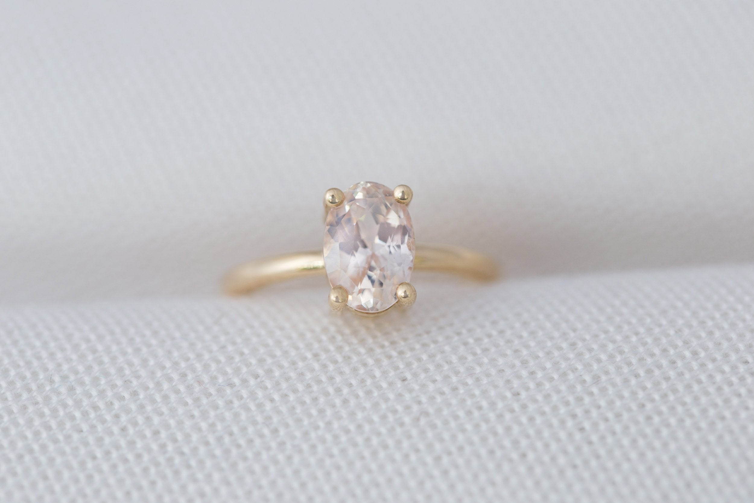 Briar Ring | Icy Pink Oval Sapphire Solitaire Engagement Ring 2.43 ct | 14k Recycled Gold | One of a Kind