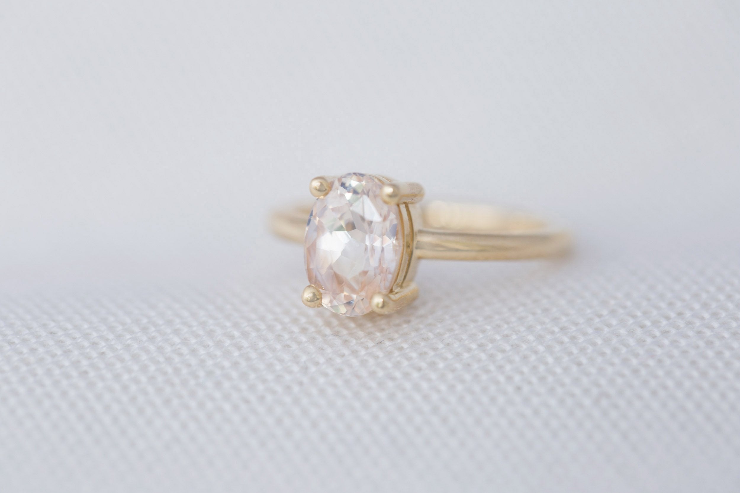 Briar Ring | Icy Pink Oval Sapphire Solitaire Engagement Ring 2.43 ct | 14k Recycled Gold | One of a Kind