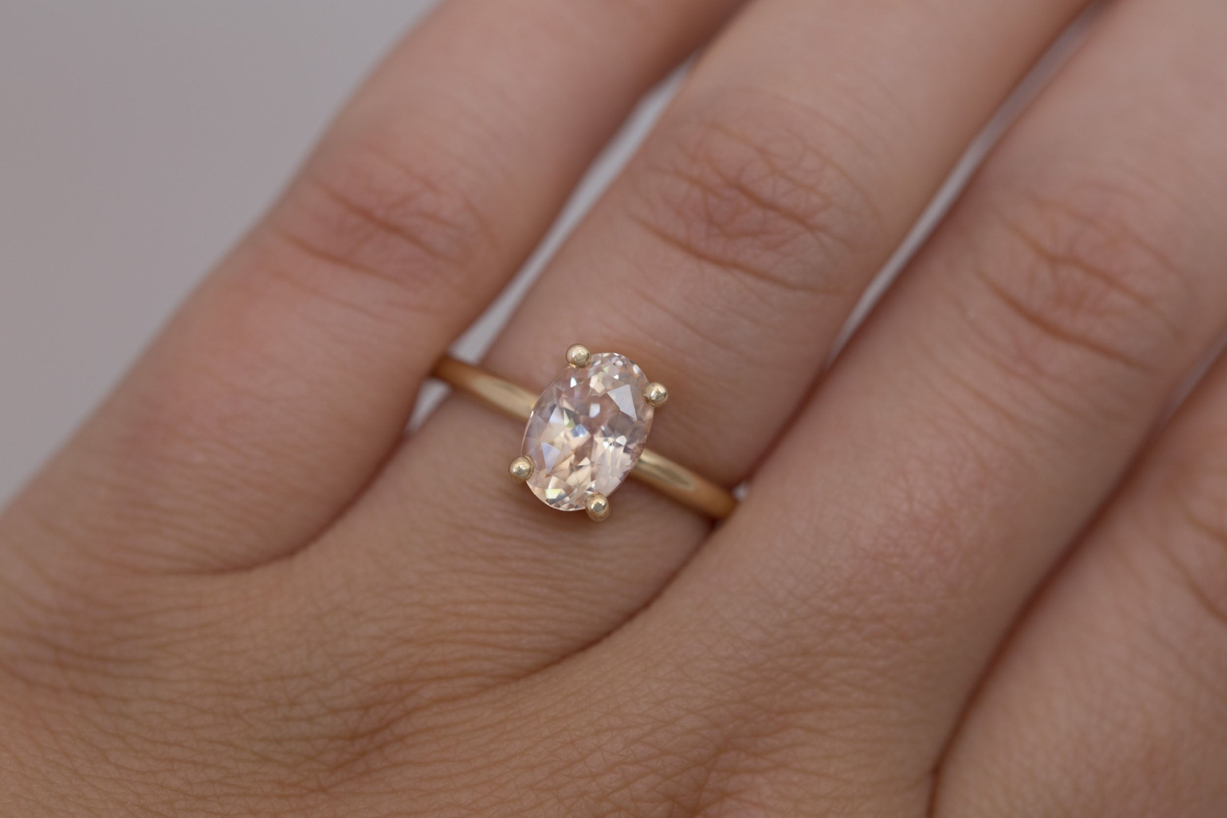 Briar Ring | Icy Pink Oval Sapphire Solitaire Engagement Ring 2.43 ct | 14k Recycled Gold | One of a Kind
