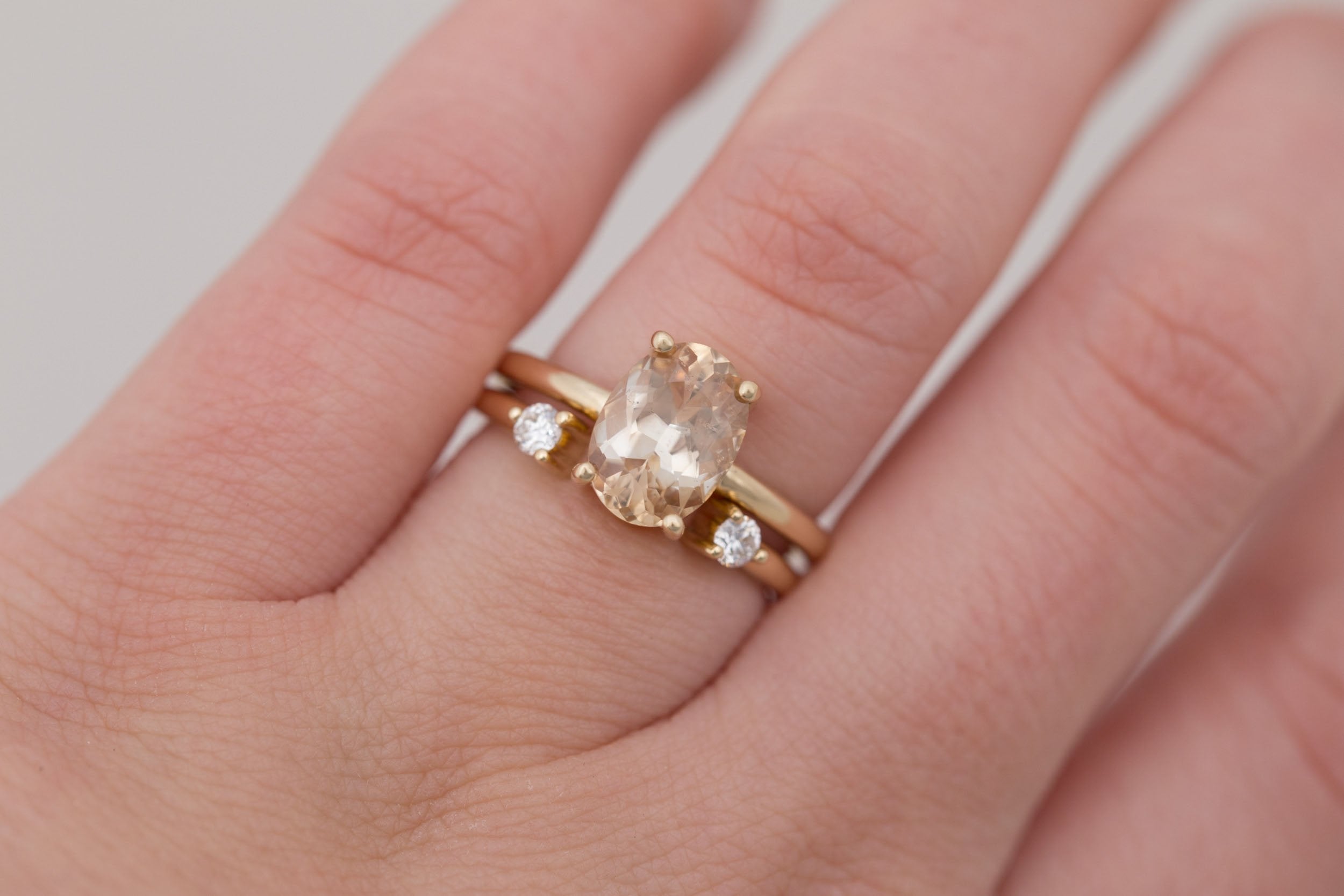 Briar Ring | Apricot Oval Bicolor Sapphire Solitaire Engagement Ring 2.46 ct | 14k Recycled Gold | One of a Kind