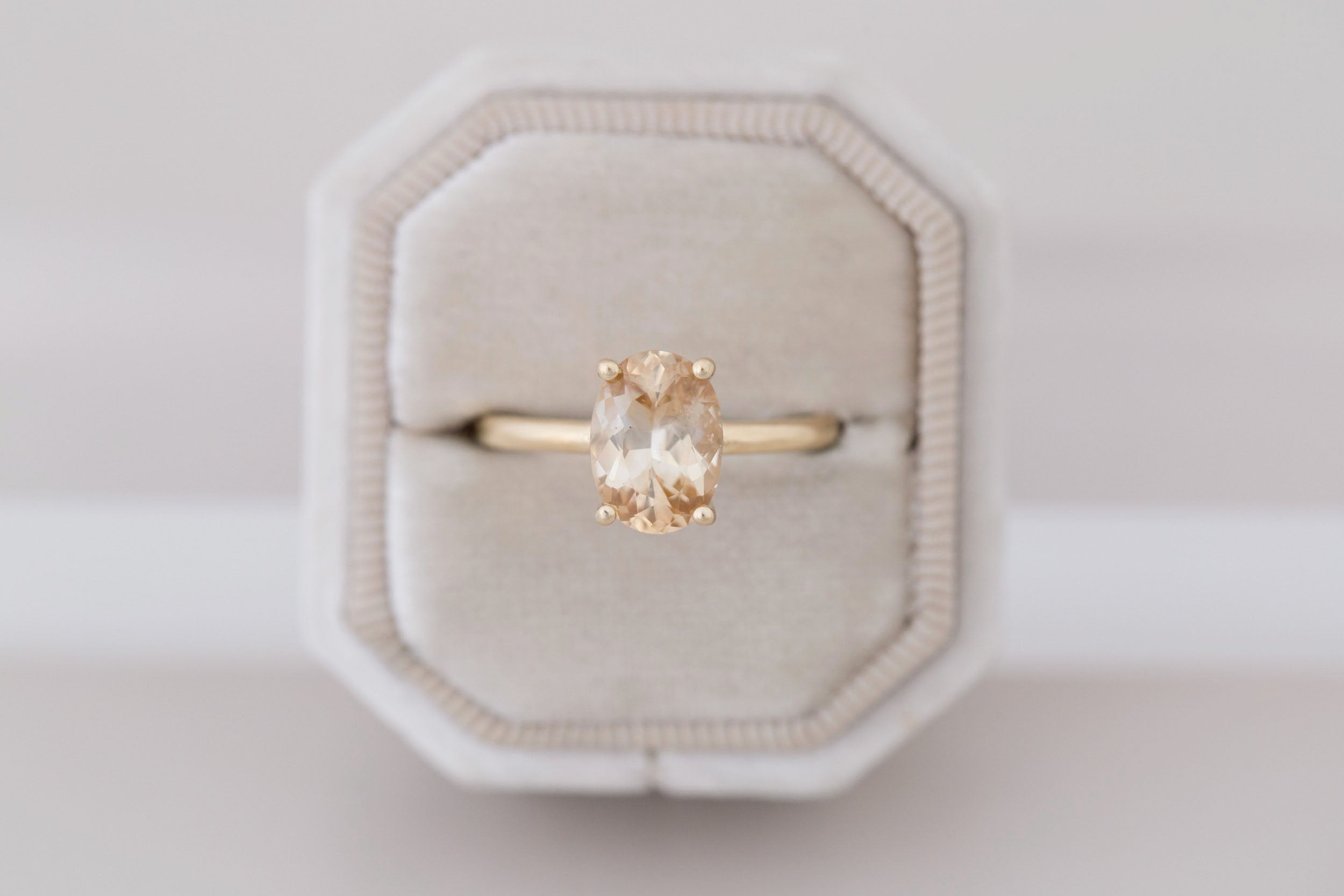 Briar Ring | Apricot Oval Bicolor Sapphire Solitaire Engagement Ring 2.46 ct | 14k Recycled Gold | One of a Kind