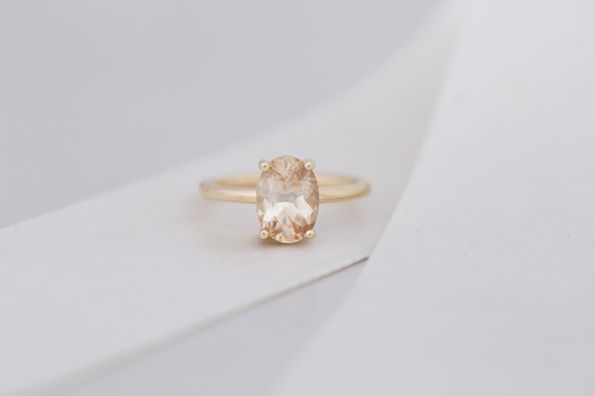 Briar Ring | Apricot Oval Bicolor Sapphire Solitaire Engagement Ring 2.46 ct | 14k Recycled Gold | One of a Kind
