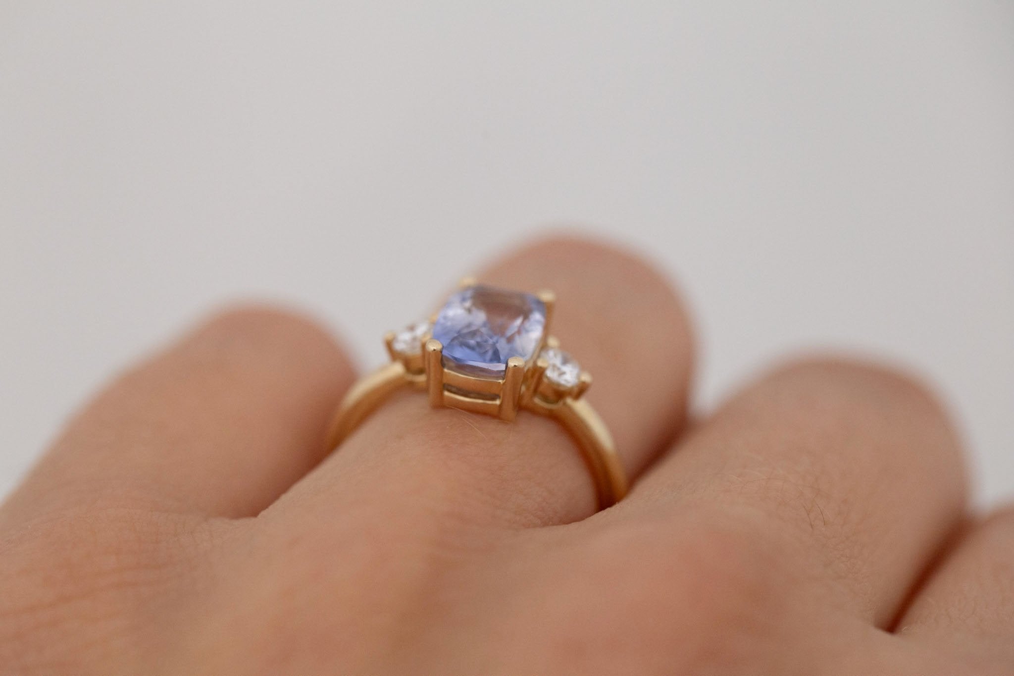 Maeve Ring | Bicolor Lavender Cushion Sapphire + Round Diamond Accent Engagement Ring 2.52 ct | 14k Recycled Gold | One of a Kind