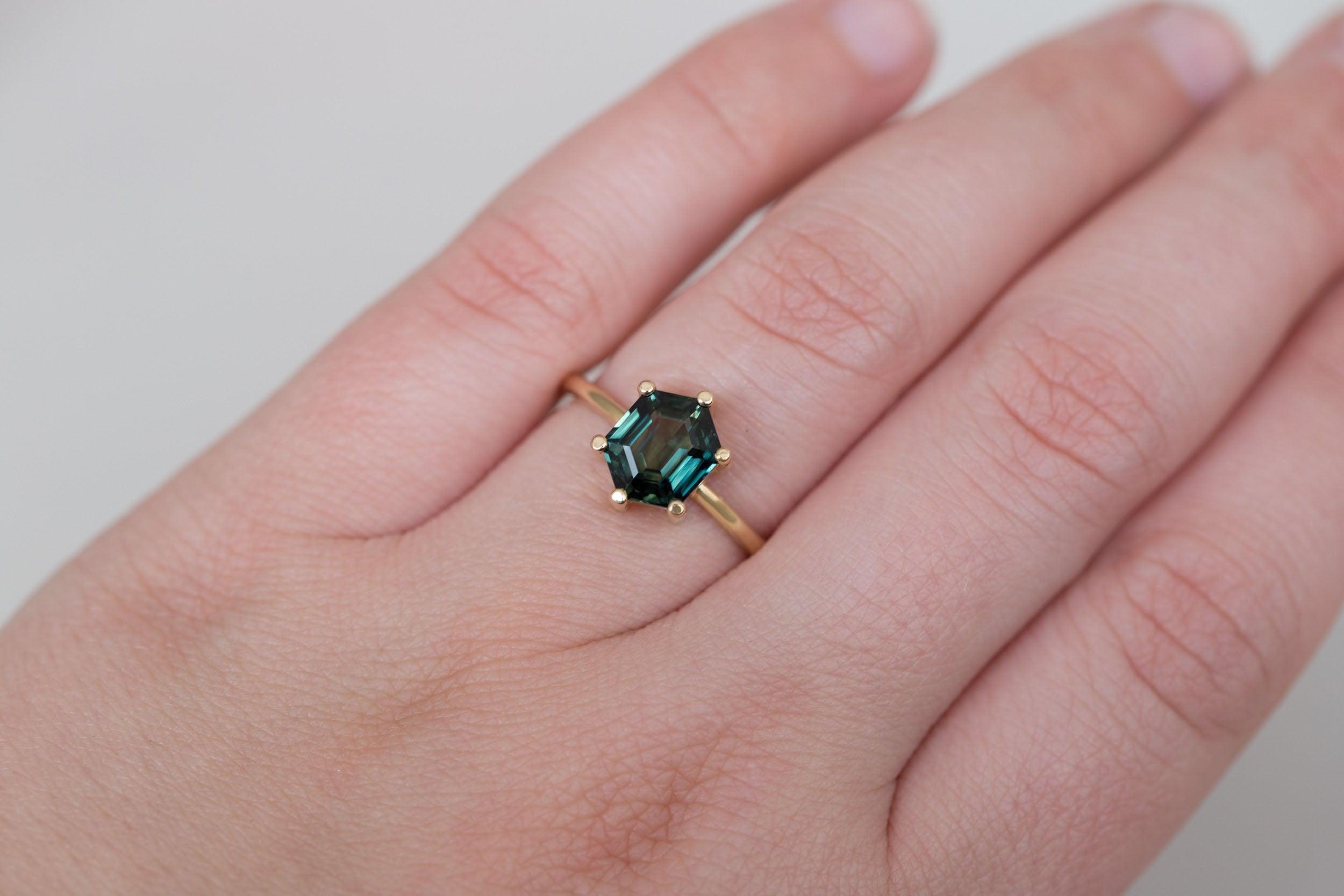 Mesa Ring | Dark Teal Step Cut Hexagon Sapphire Solitaire Engagement Ring 2.55 ct | 14k Recycled Gold | One of a Kind