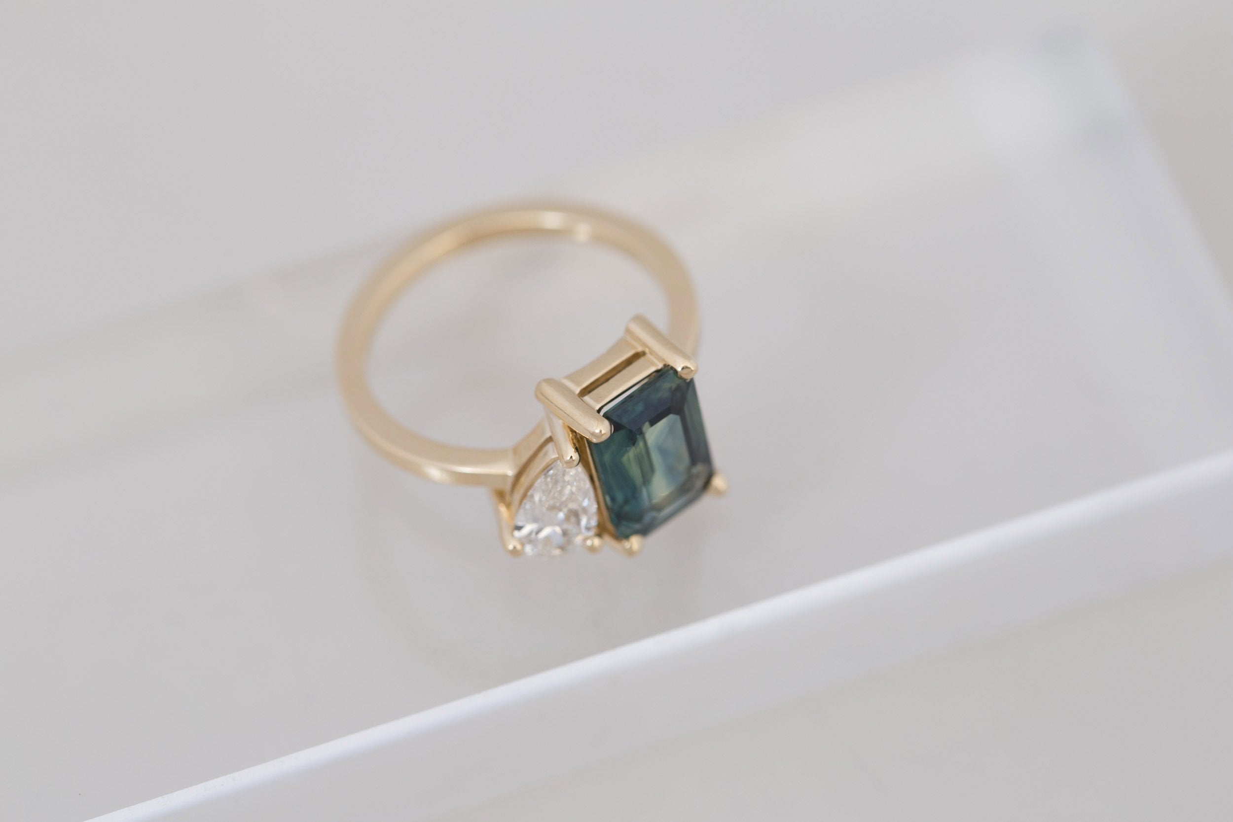 Liana Ring | Teal Emerald Cut Sapphire + Pear Diamond Engagement Ring | 14k Recycled Gold | One of a Kind