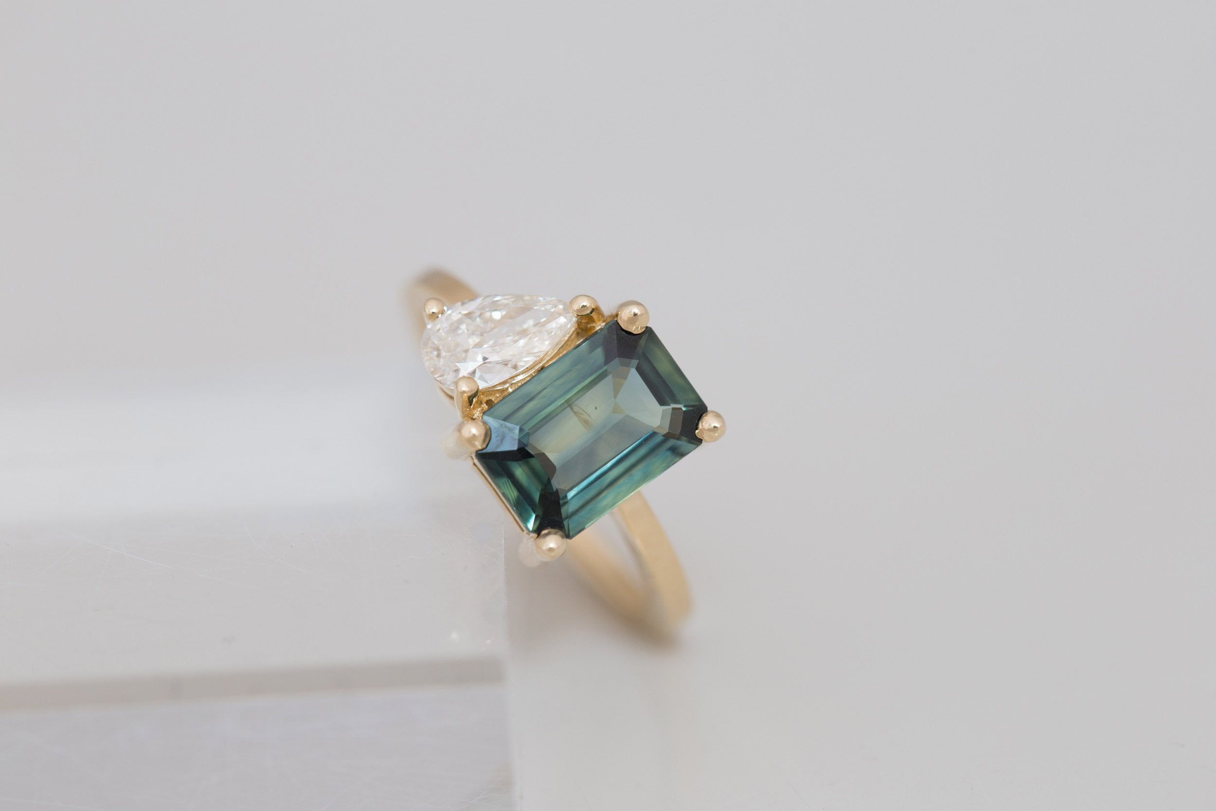 Liana Ring | Teal Emerald Cut Sapphire + Pear Diamond Engagement Ring | 14k Recycled Gold | One of a Kind