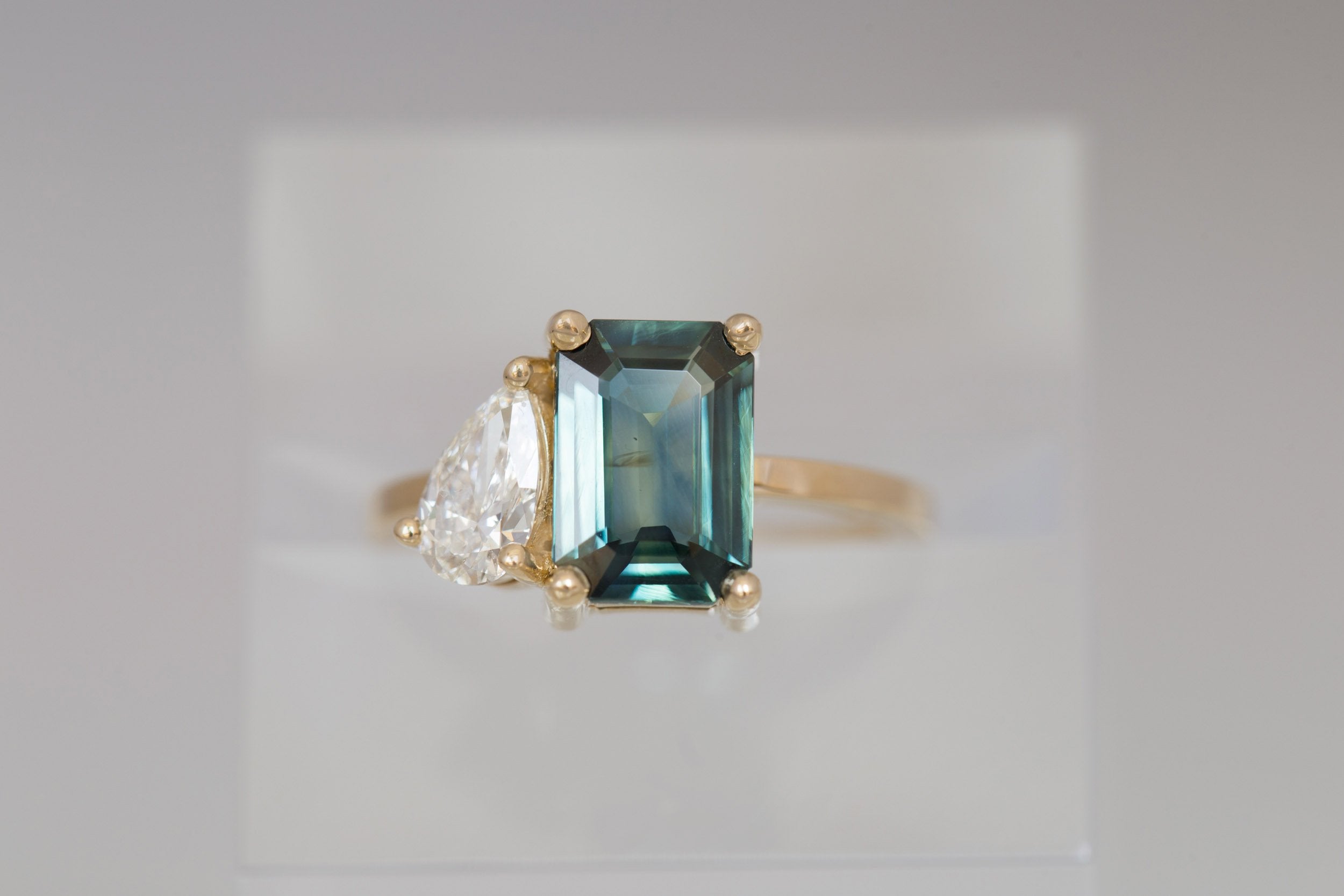 Liana Ring | Teal Emerald Cut Sapphire + Pear Diamond Engagement Ring | 14k Recycled Gold | One of a Kind