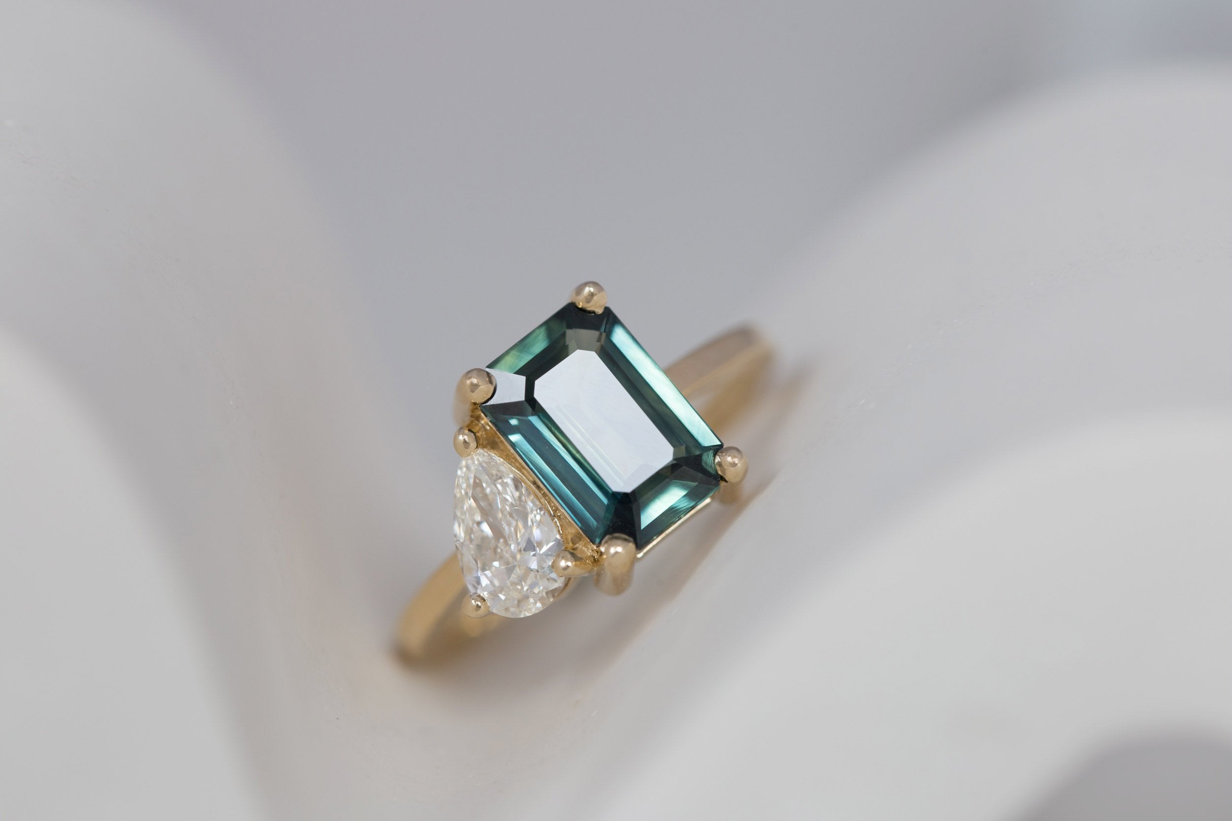 Liana Ring | Teal Emerald Cut Sapphire + Pear Diamond Engagement Ring | 14k Recycled Gold | One of a Kind