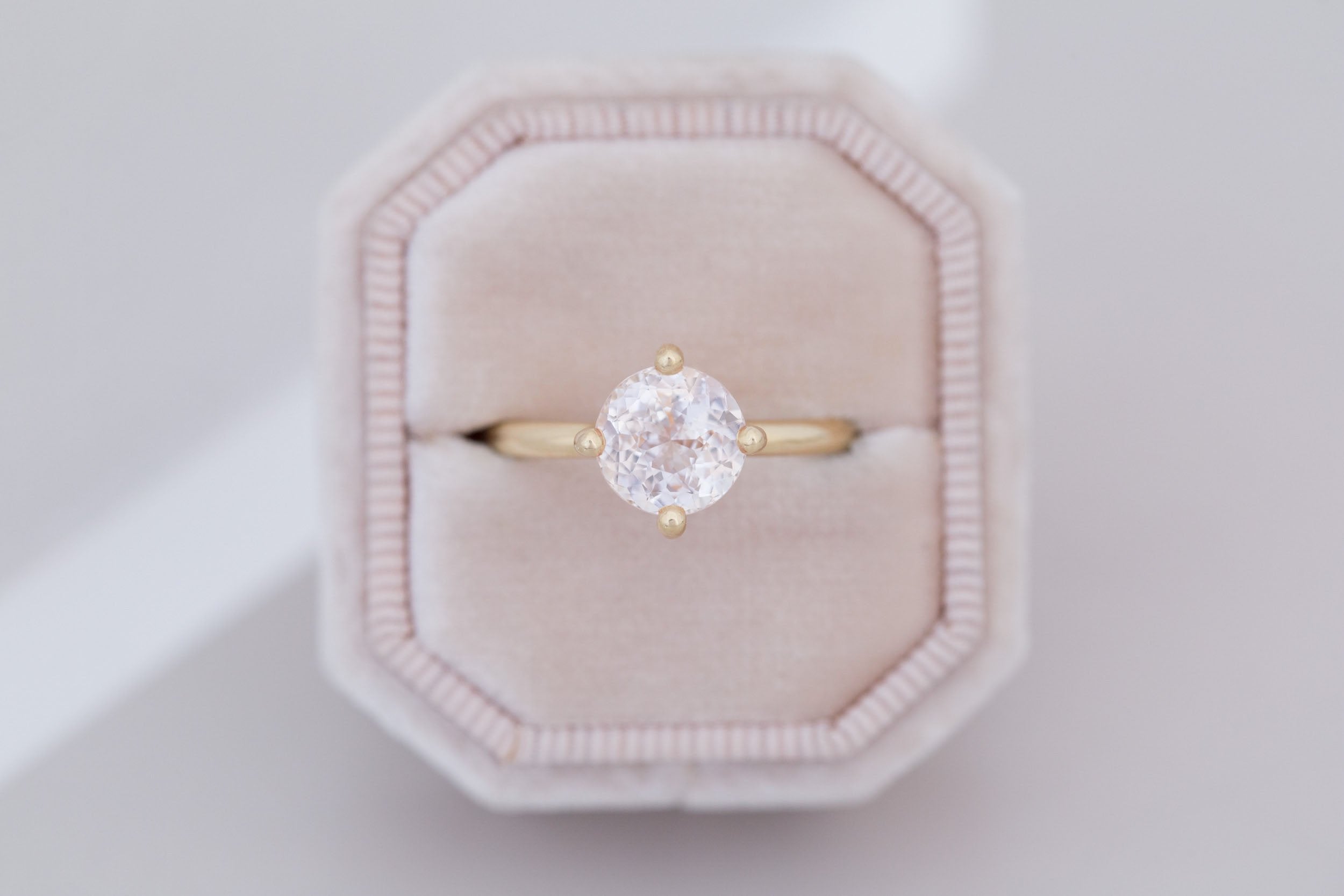 Leta Ring | Icy Blush Round Sapphire Compass Set Solitaire Engagement Ring 2.70 ct | 14k Recycled Gold | One of a Kind