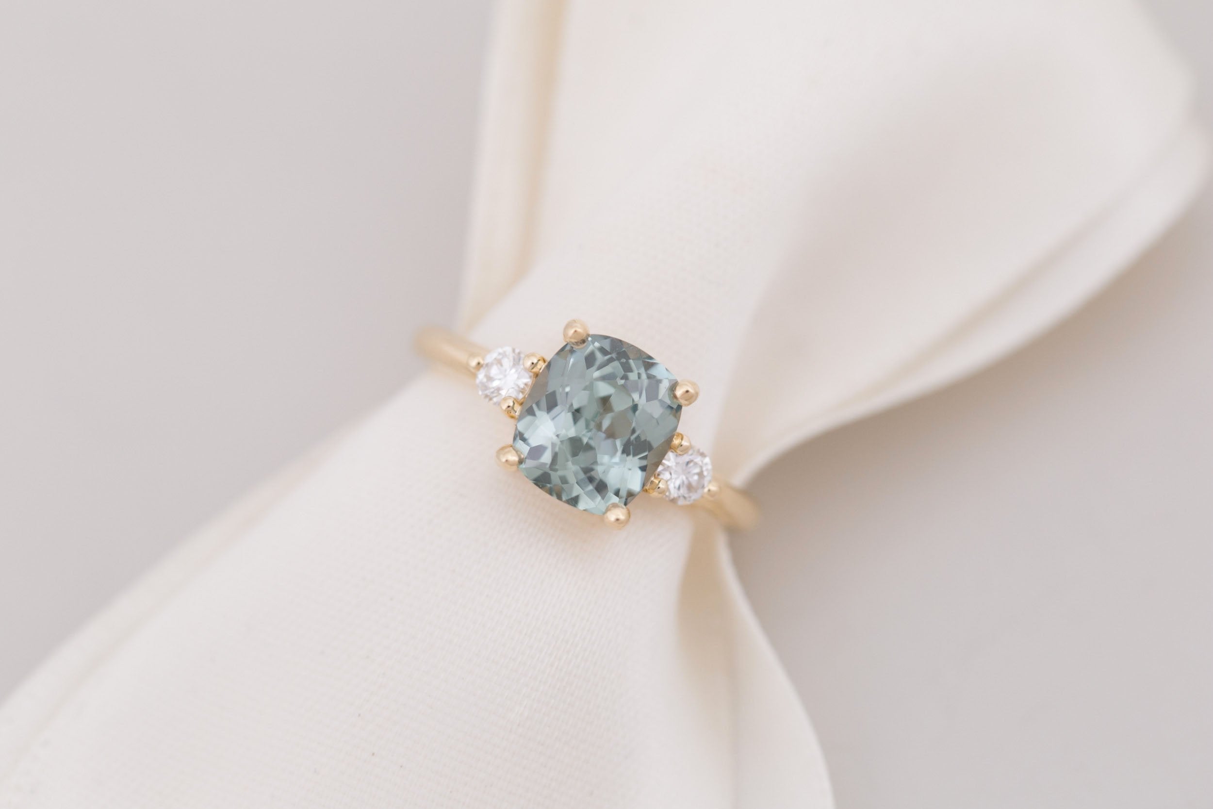 Maeve Ring | Mint Cushion Sapphire + Round Diamond Accent Engagement Ring 2.81 ct | 14k Recycled Gold | One of a Kind