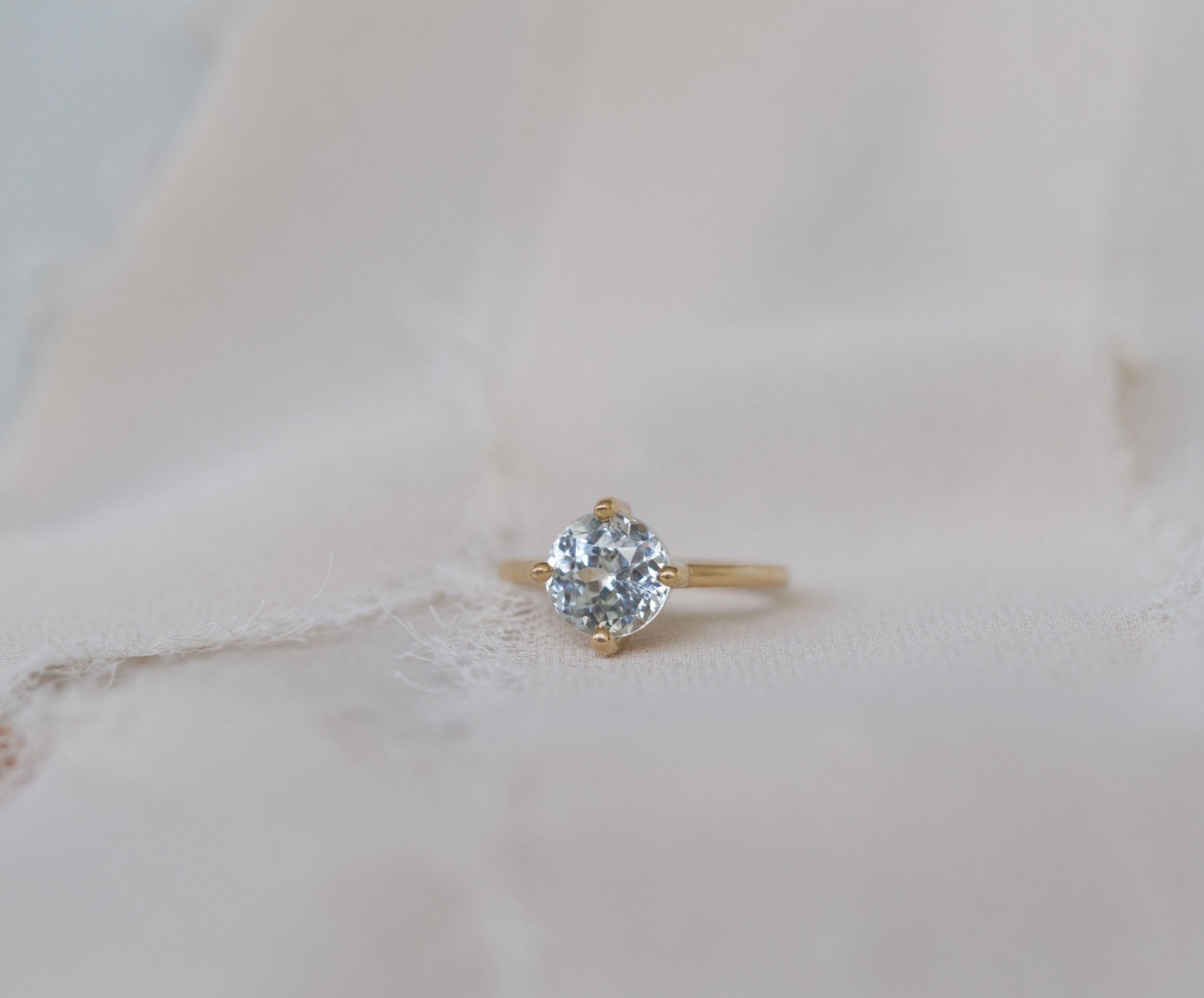 Leta Ring | Icy Grey Round Sapphire Compass Set Solitaire Engagement Ring 3.27 ct | 14k Recycled Gold | One of a Kind