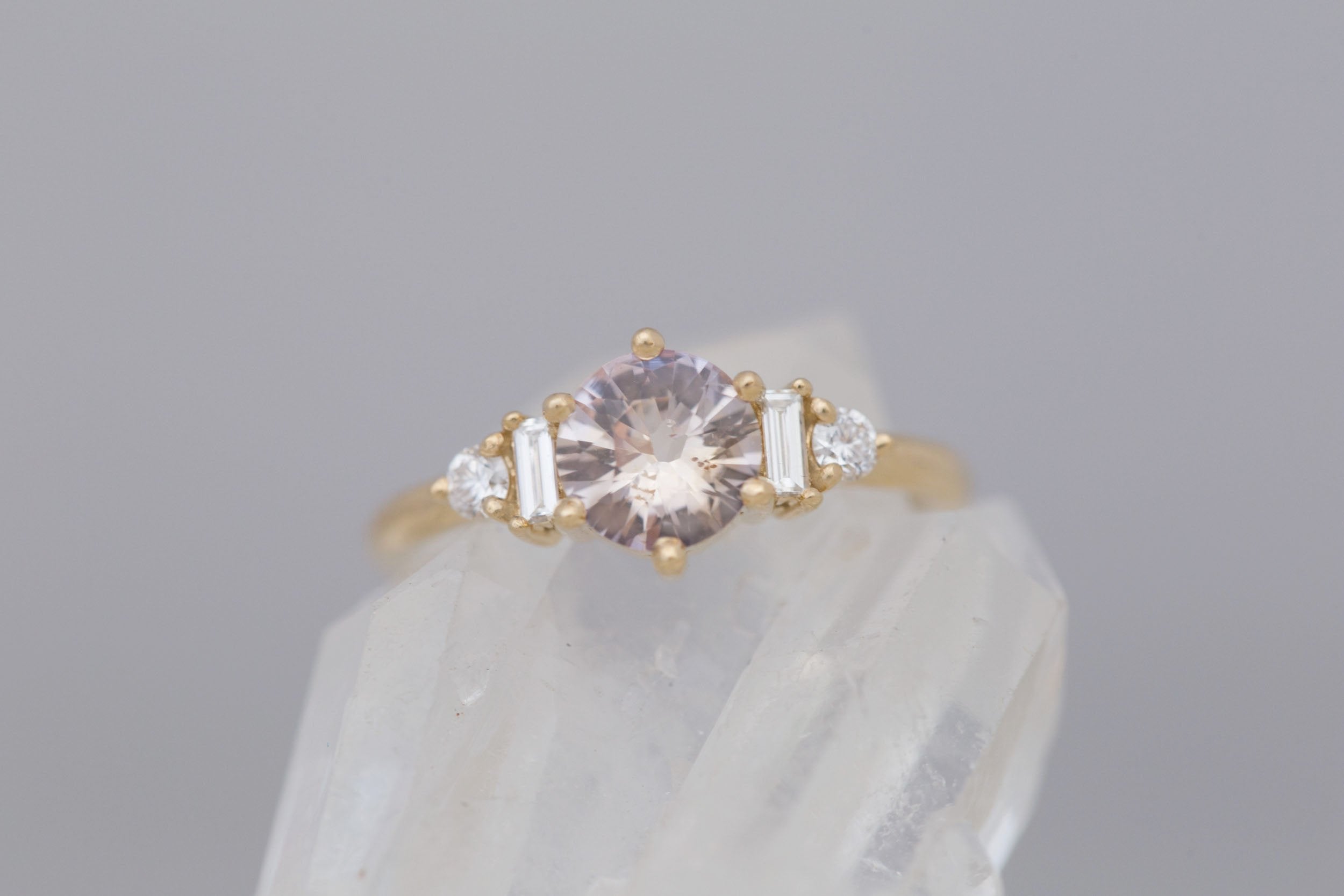 Alsea Ring | Peach Round Sapphire + Baguette and Round Diamond Accent Engagement Ring 1.08 ct | 14k Recycled Yellow Gold | One of a Kind