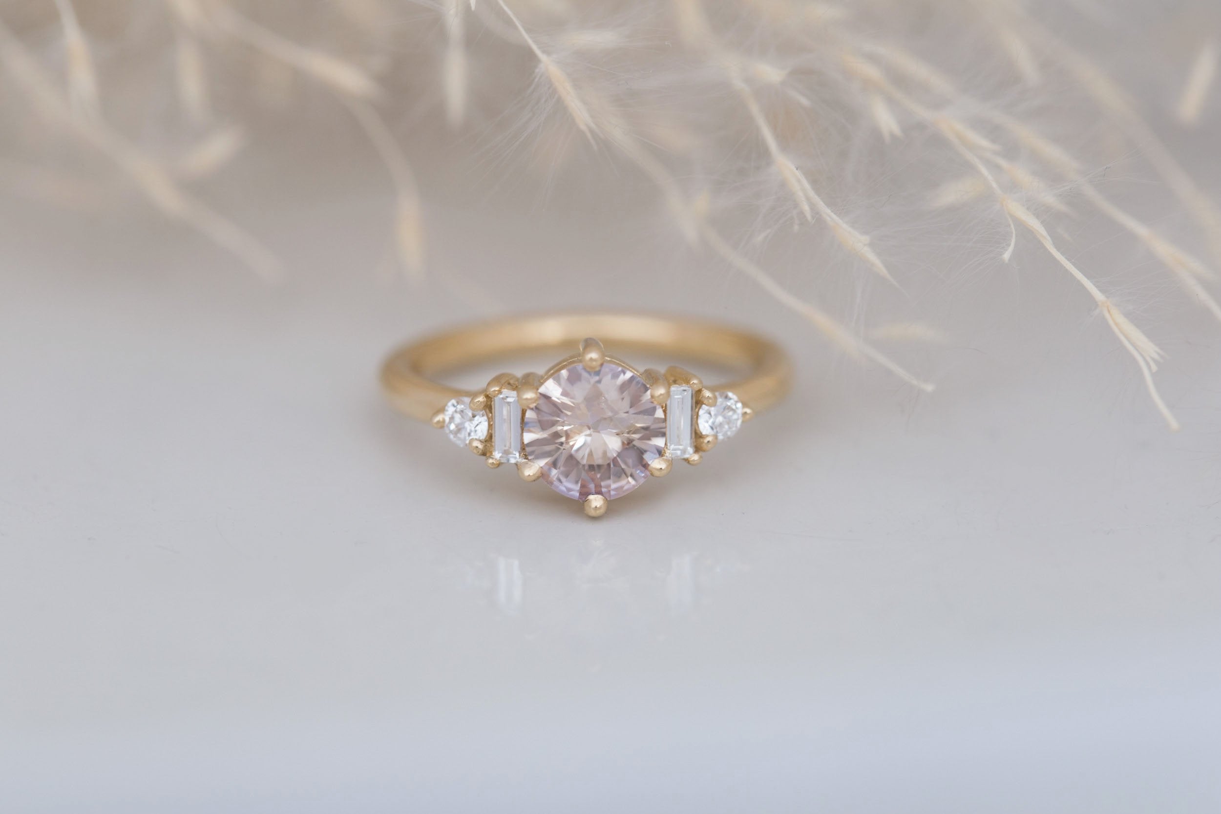 Alsea Ring | Peach Round Sapphire + Baguette and Round Diamond Accent Engagement Ring 1.08 ct | 14k Recycled Yellow Gold | One of a Kind