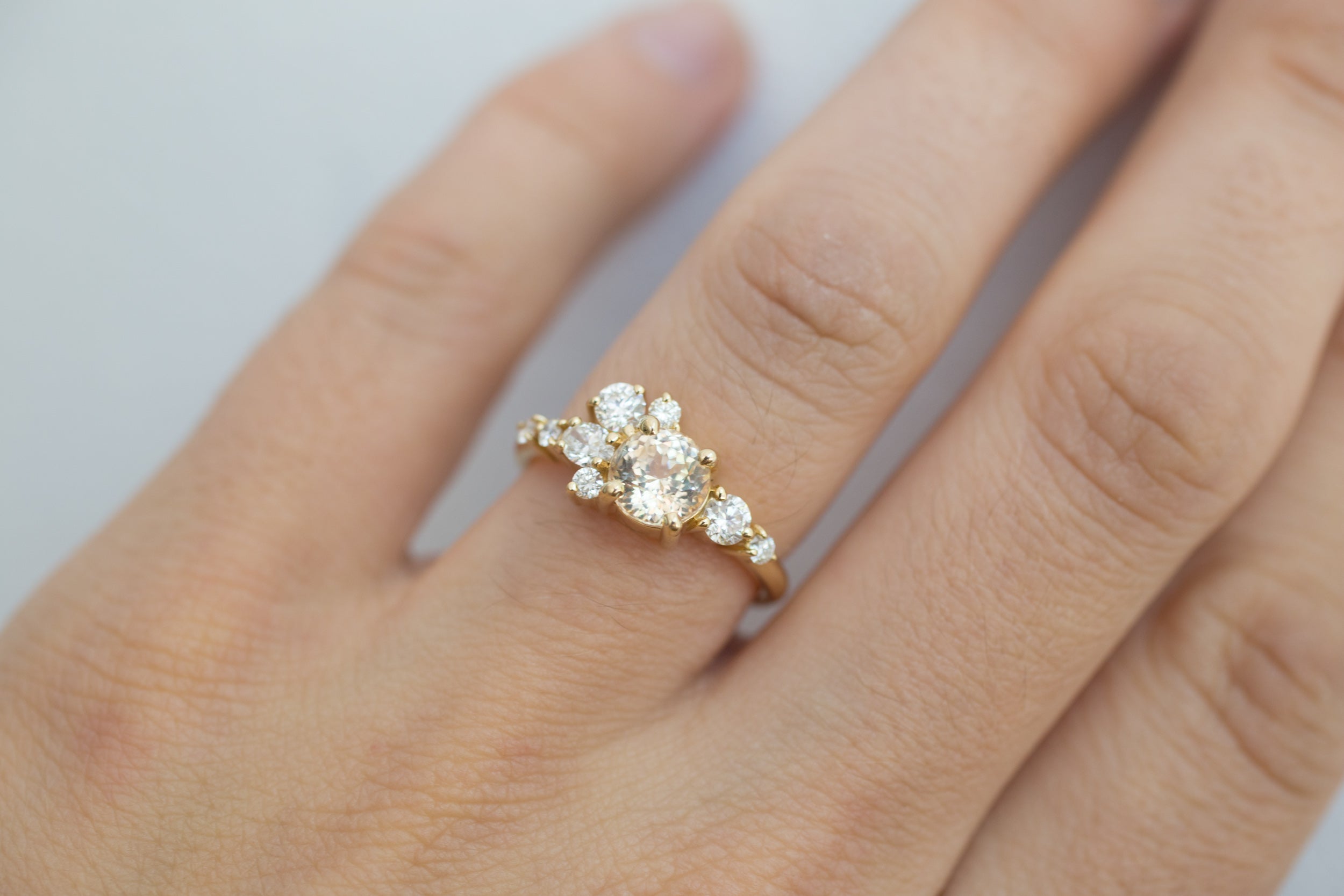 Ilia Ring | Apricot Round Sapphire + Diamond Cluster Engagement Ring | 14k Recycled Gold | One of a Kind
