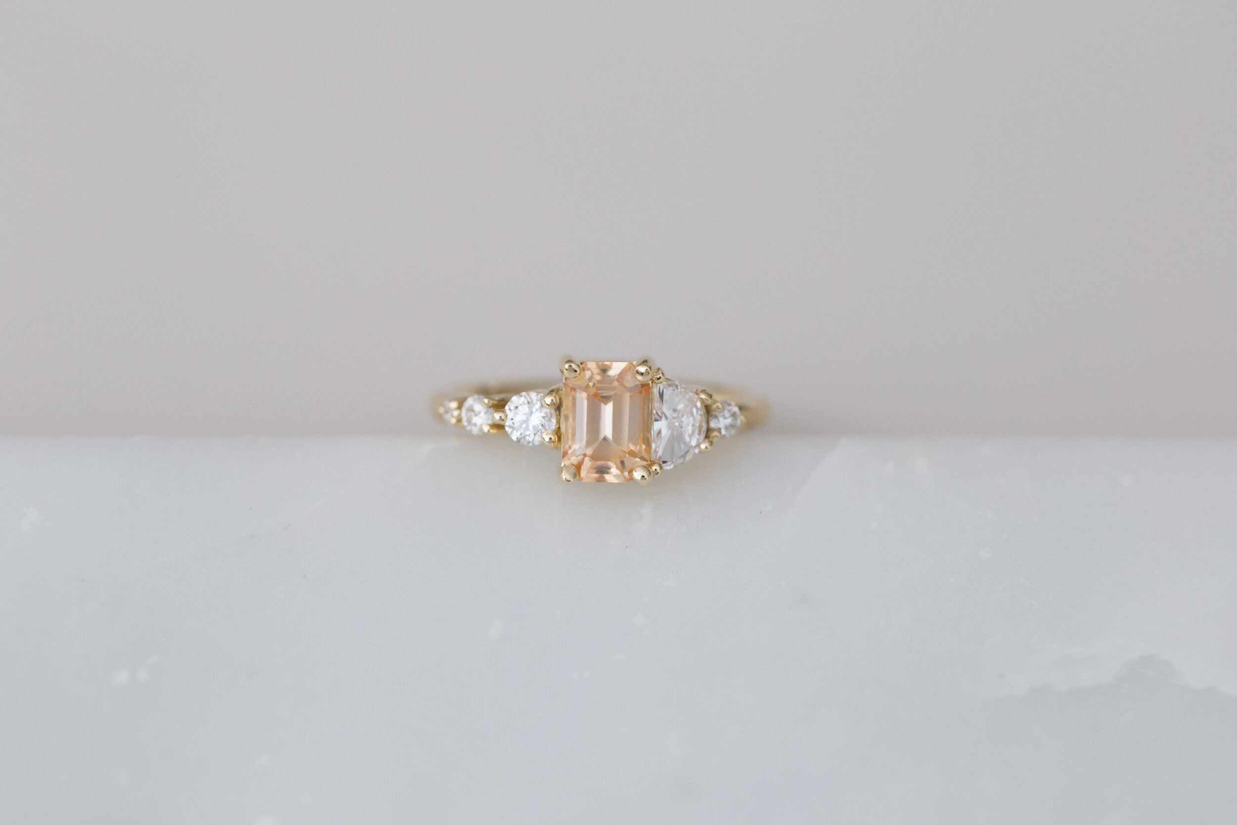 Sarine Ring | Apricot Sapphire + Half Moon Diamond + Diamond Cluster Engagement Ring | 14k Recycled Gold | One of a Kind