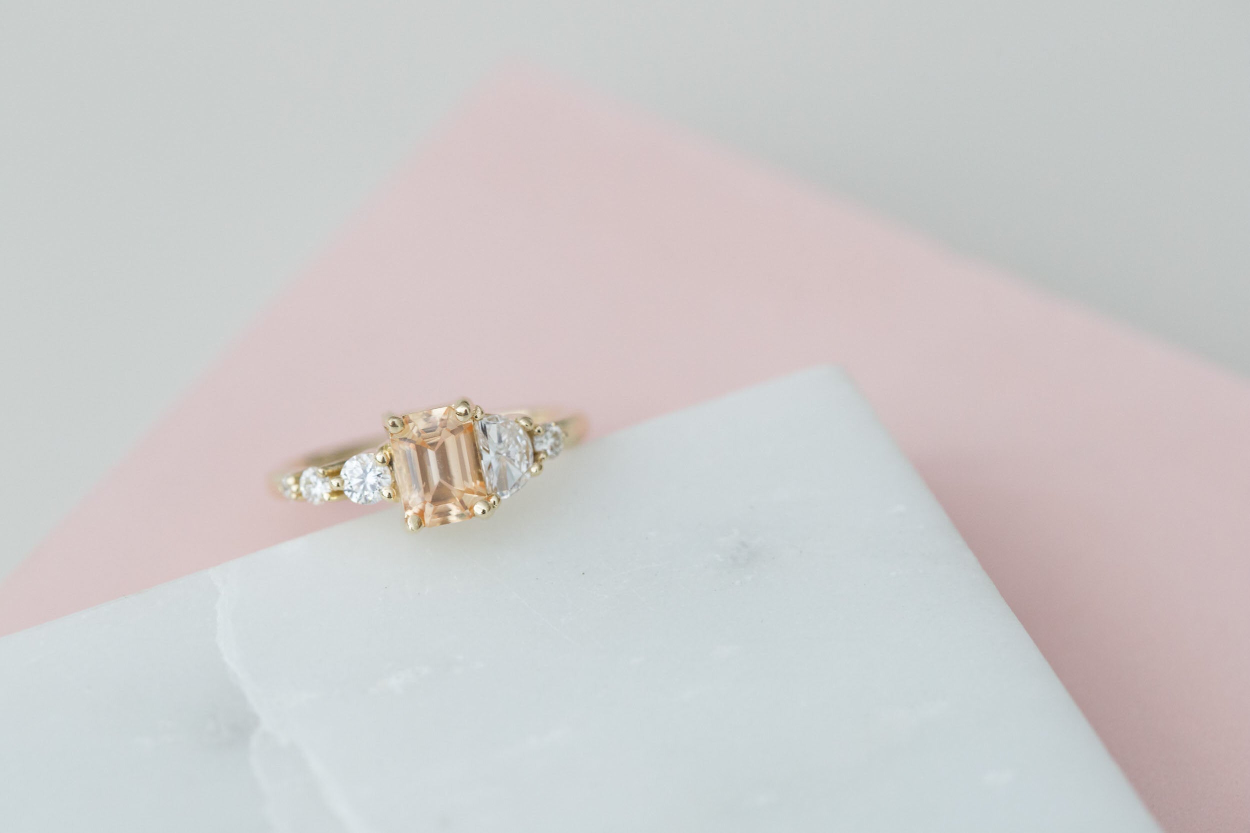 Sarine Ring | Apricot Sapphire + Half Moon Diamond + Diamond Cluster Engagement Ring | 14k Recycled Gold | One of a Kind