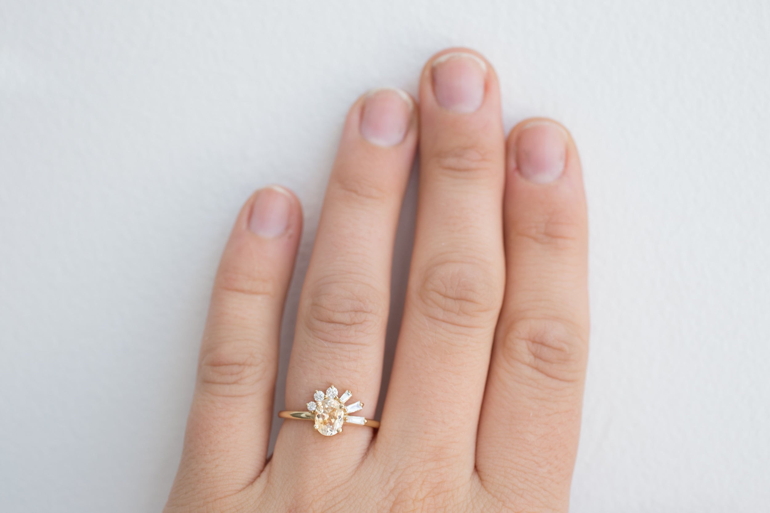 Sol Ring | Apricot Oval Sapphire + Baguette and Round Diamond Cluster Engagement Ring | 14k Recycled Gold | Limited Edition