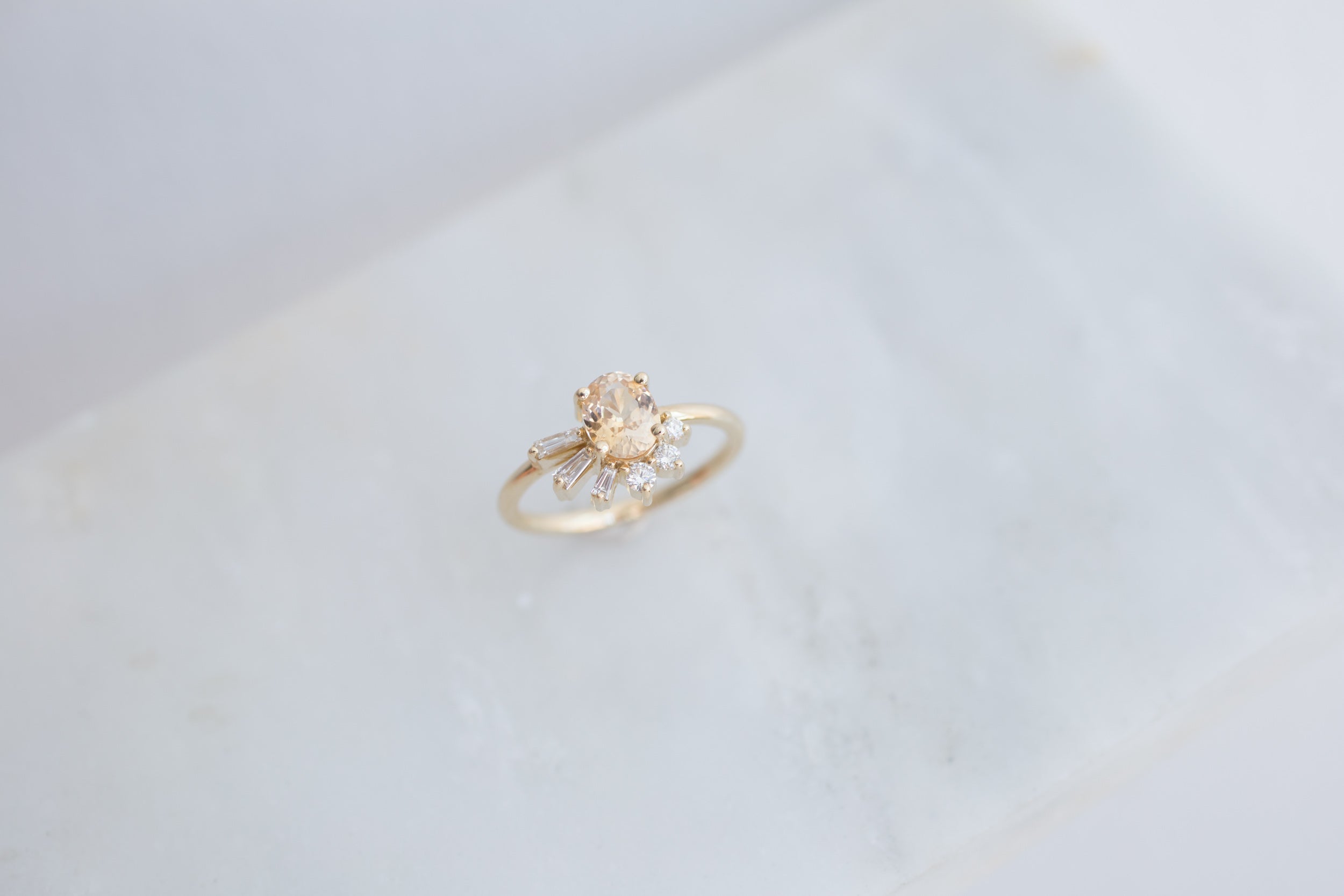 Sol Ring | Apricot Oval Sapphire + Baguette and Round Diamond Cluster Engagement Ring | 14k Recycled Gold | Limited Edition