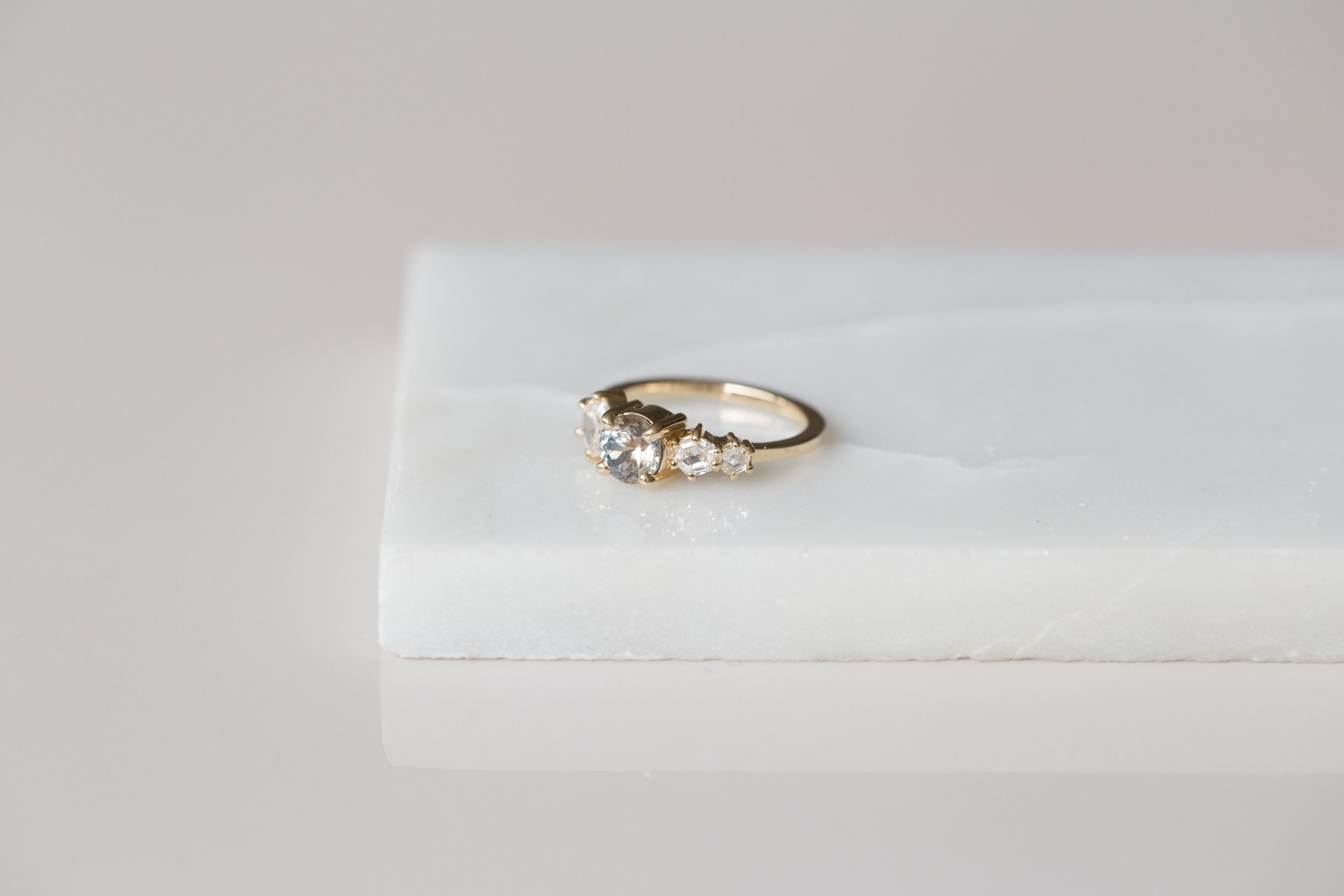 Aster Ring | Bicolor Montana Sapphire + Hexagon Diamond Cluster Engagement Ring | 14k Recycled Gold