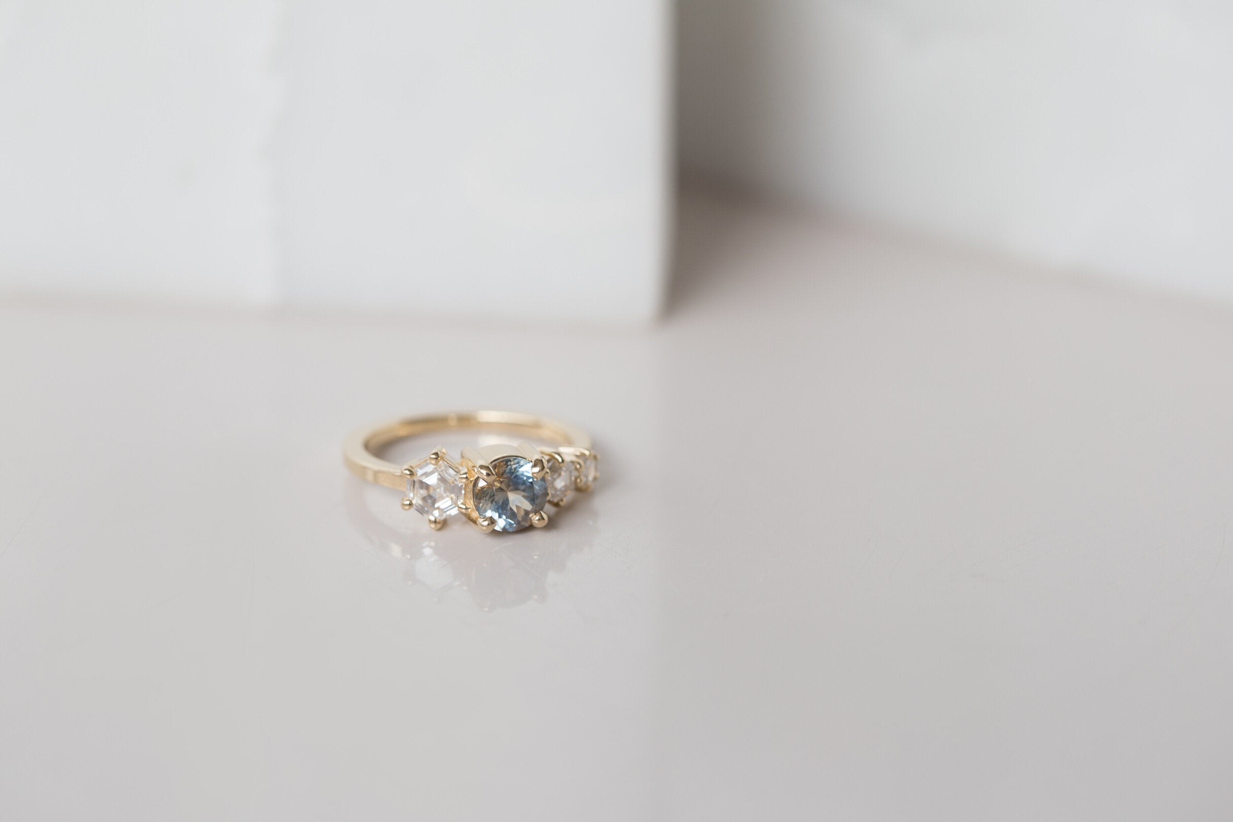 Aster Ring | Bicolor Montana Sapphire + Hexagon Diamond Cluster Engagement Ring | 14k Recycled Gold