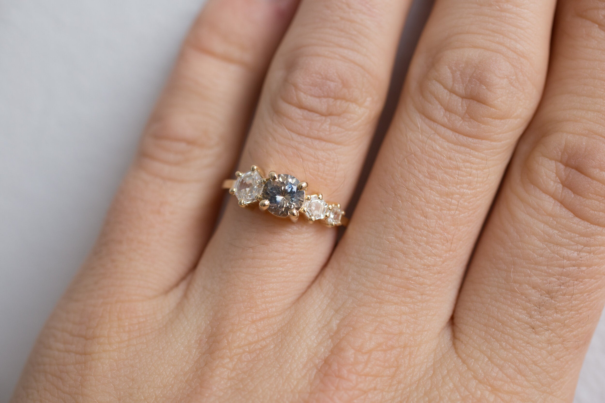 Aster Ring | Bicolor Montana Sapphire + Hexagon Diamond Cluster Engagement Ring | 14k Recycled Gold