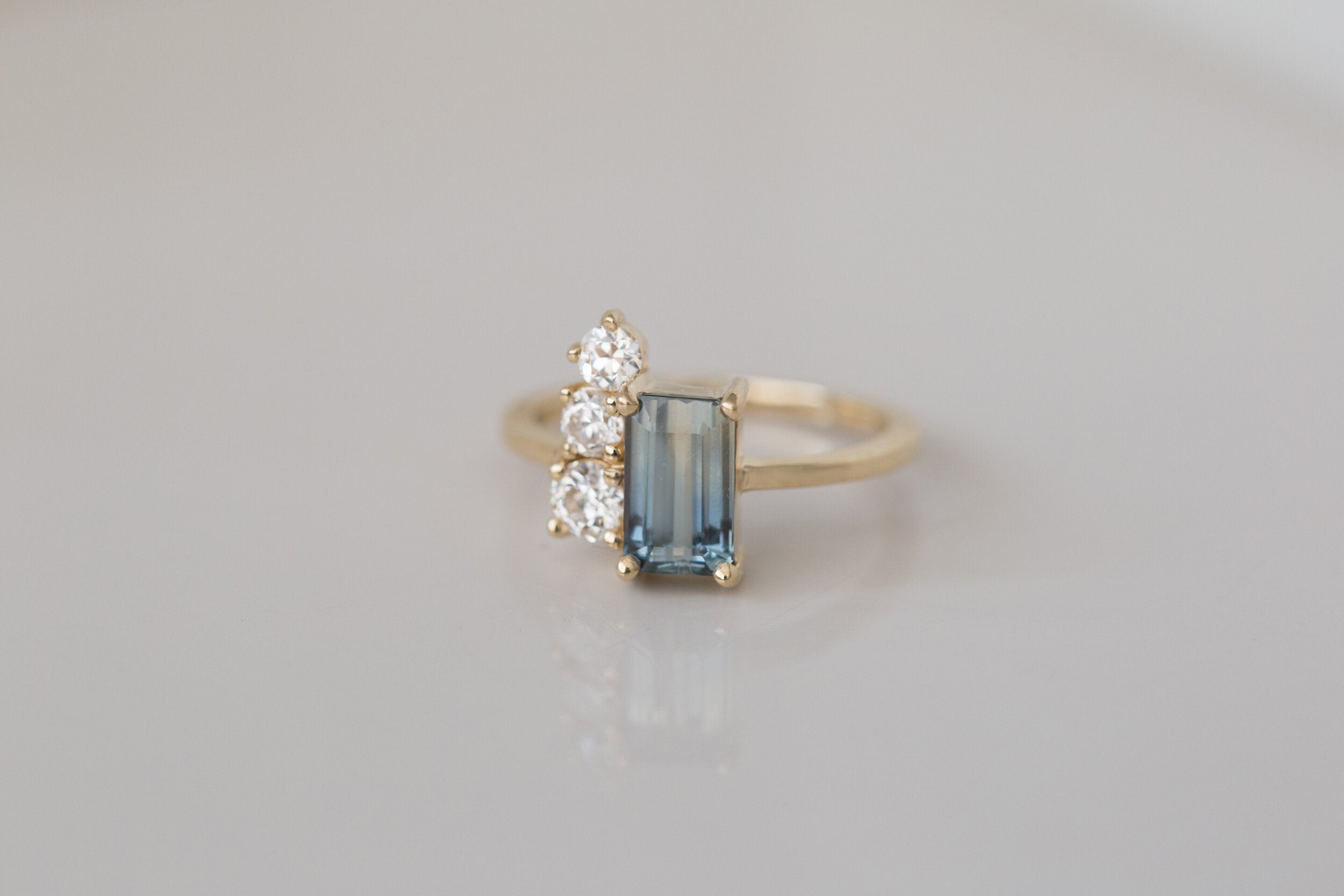 Adra Ring | Bicolor Emerald Cut Sapphire + Old European Cut Diamond Cluster Engagement Ring | 14k Recycled Gold | One of a Kind