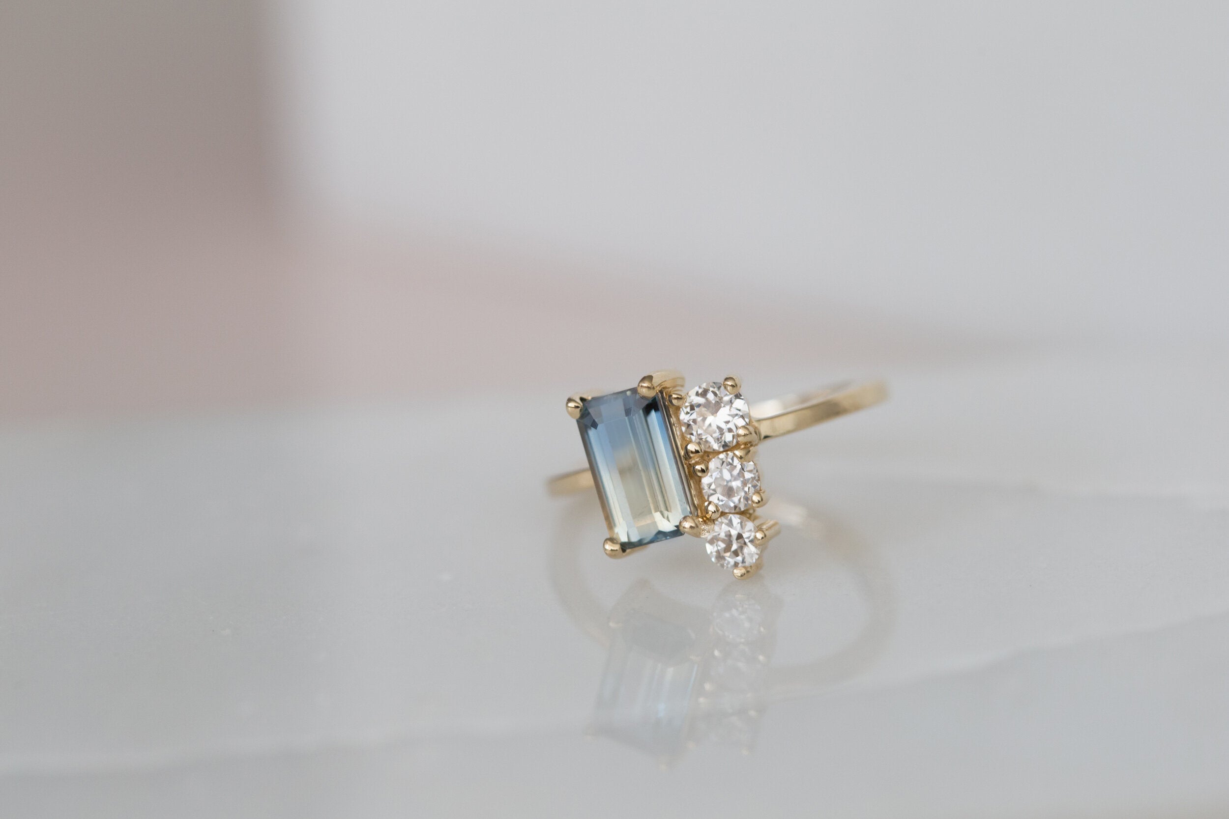 Adra Ring | Bicolor Emerald Cut Sapphire + Old European Cut Diamond Cluster Engagement Ring | 14k Recycled Gold | One of a Kind
