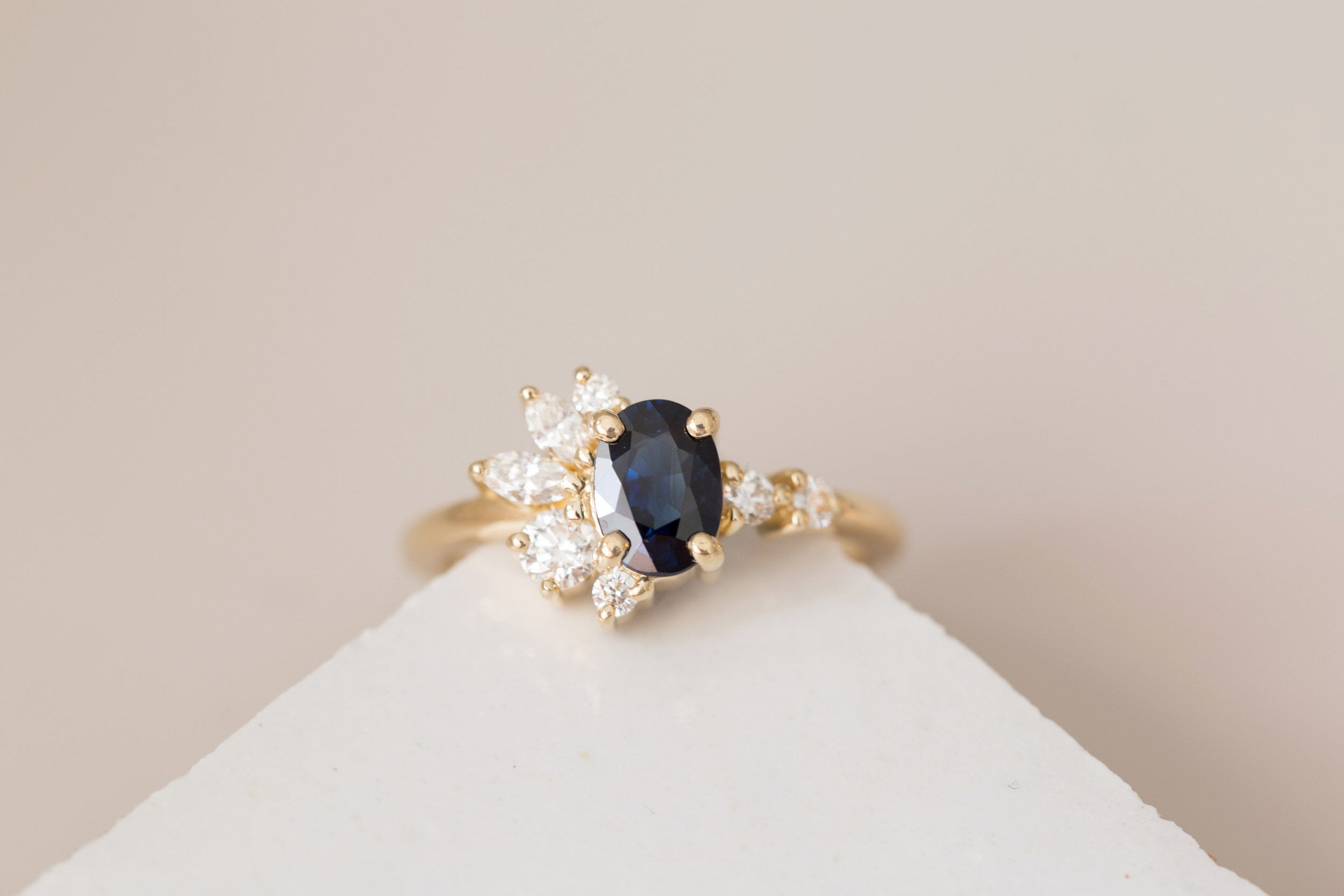 Ambretta Ring | Dark Blue Oval Sapphire + Diamond Cluster Engagement Ring | 14k Recycled Gold