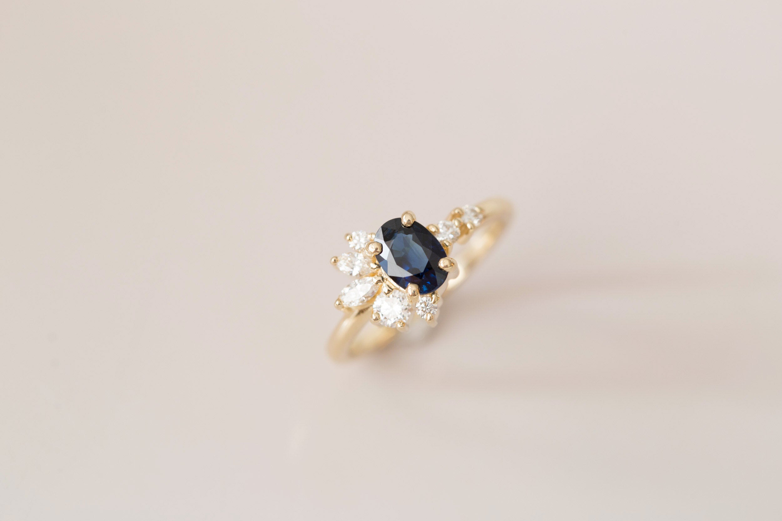 Ambretta Ring | Dark Blue Oval Sapphire + Diamond Cluster Engagement Ring | 14k Recycled Gold