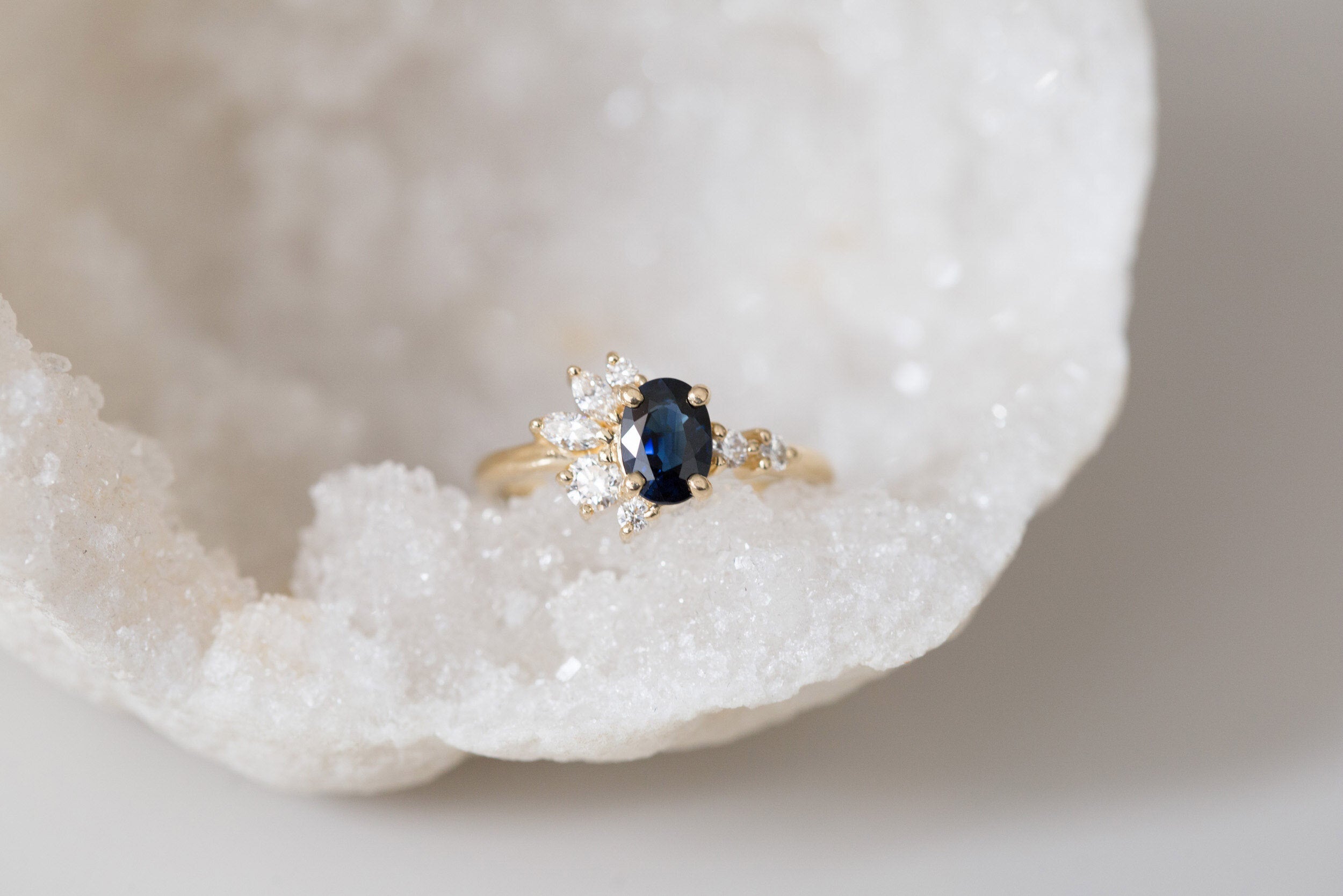 Ambretta Ring | Dark Blue Oval Sapphire + Diamond Cluster Engagement Ring | 14k Recycled Gold