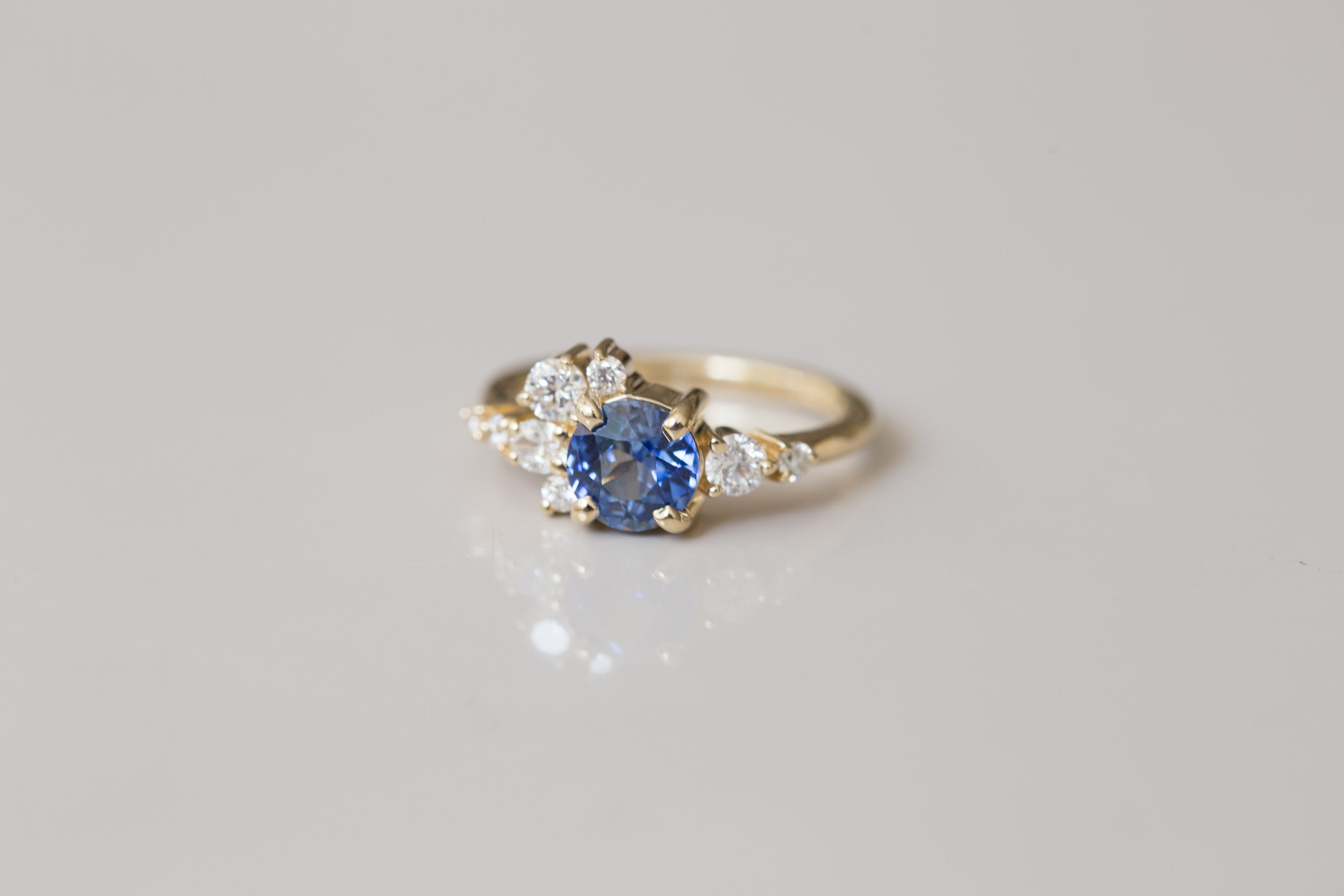 Ilia Ring | Blue Round Sapphire + Diamond Cluster Engagement Ring | 14k Recycled Gold | One of a Kind