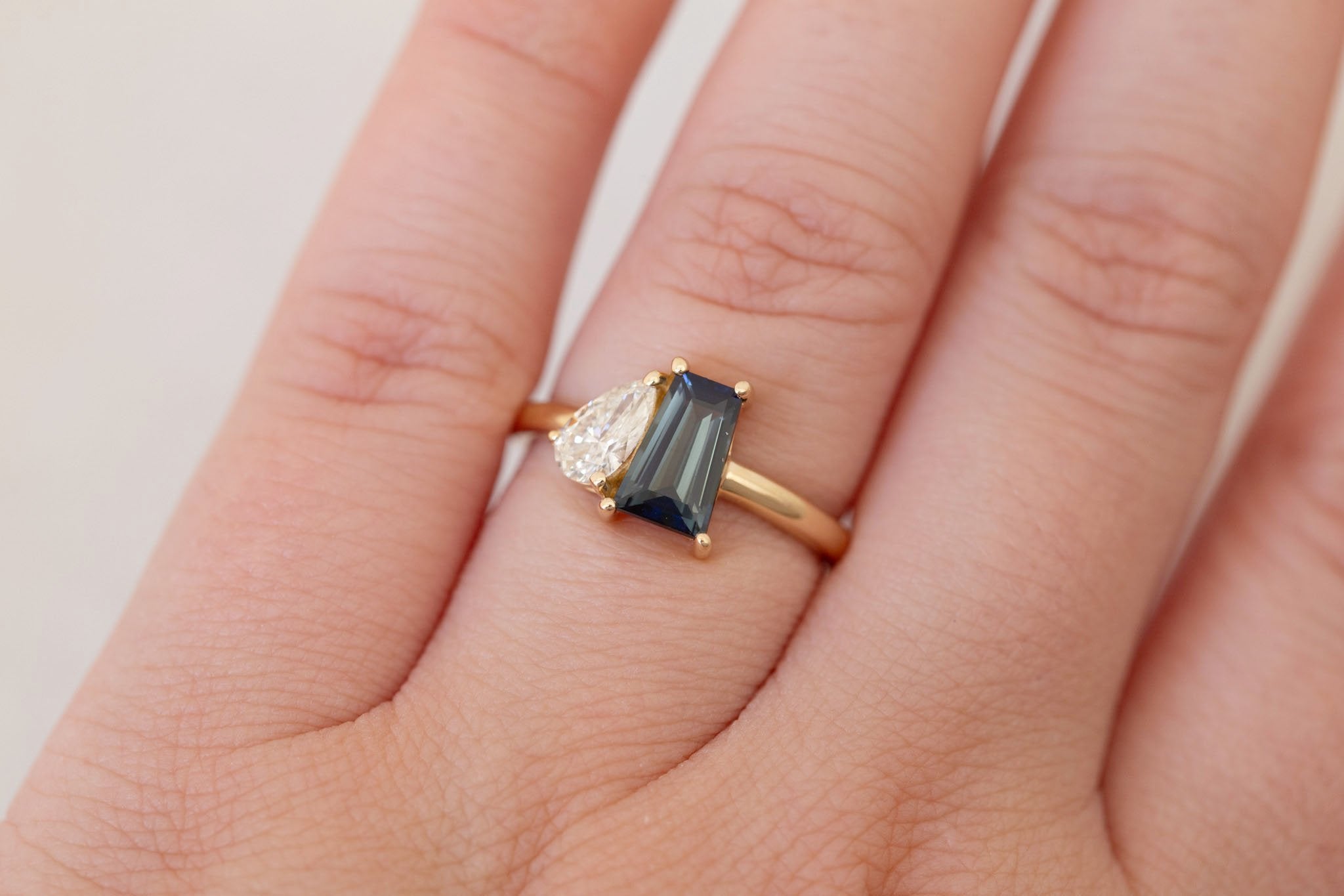 Liana Ring | Blue Trapezoid Sapphire + Pear Diamond Engagement Ring 1.32 ct | 14k Recycled Gold | One of a Kind