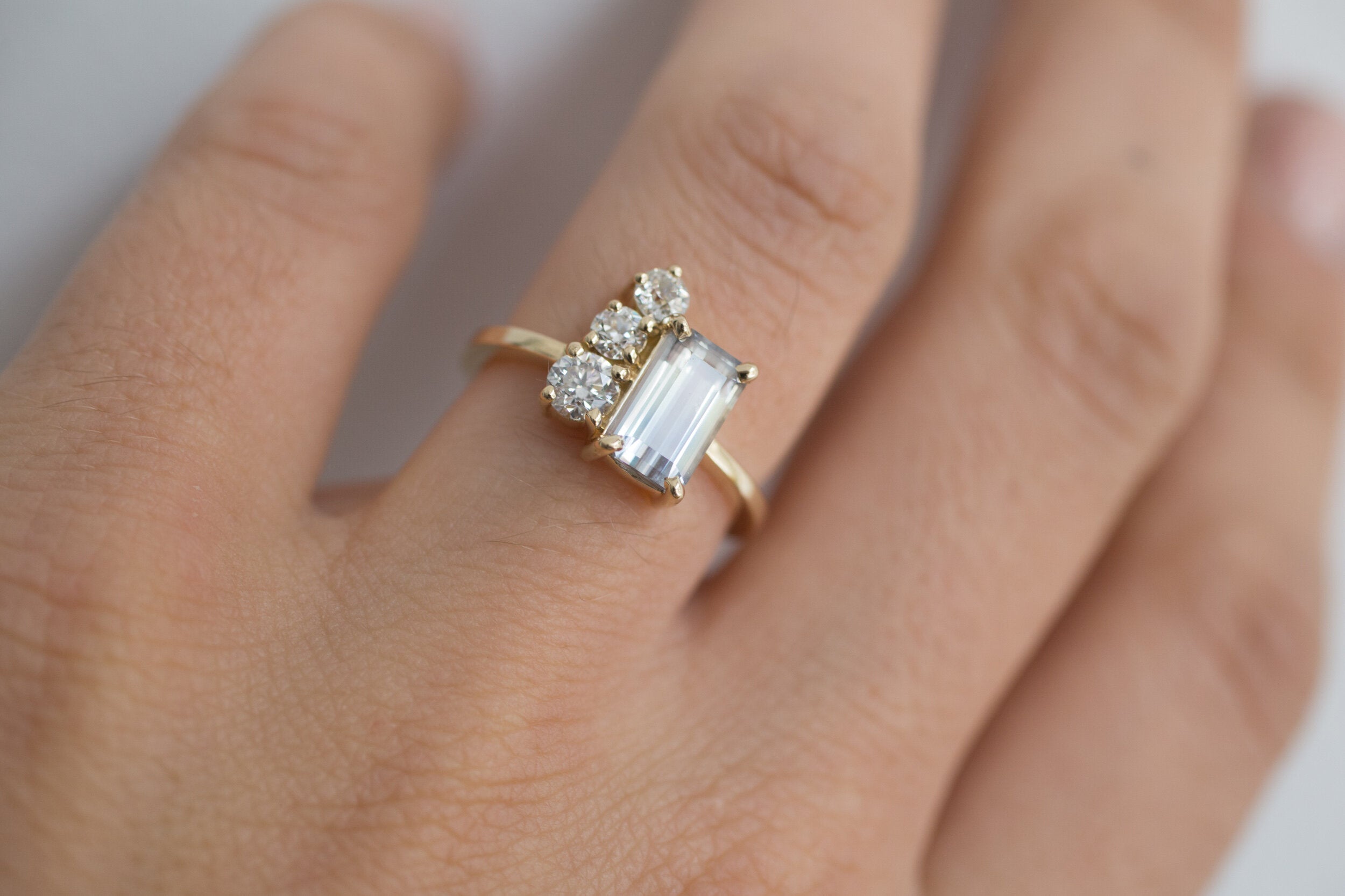 Adra Ring | Bicolor Bluish White Emerald Cut Sapphire + Old European Cut Diamond Cluster Engagement Ring | 14k Recycled Gold | One of a Kind