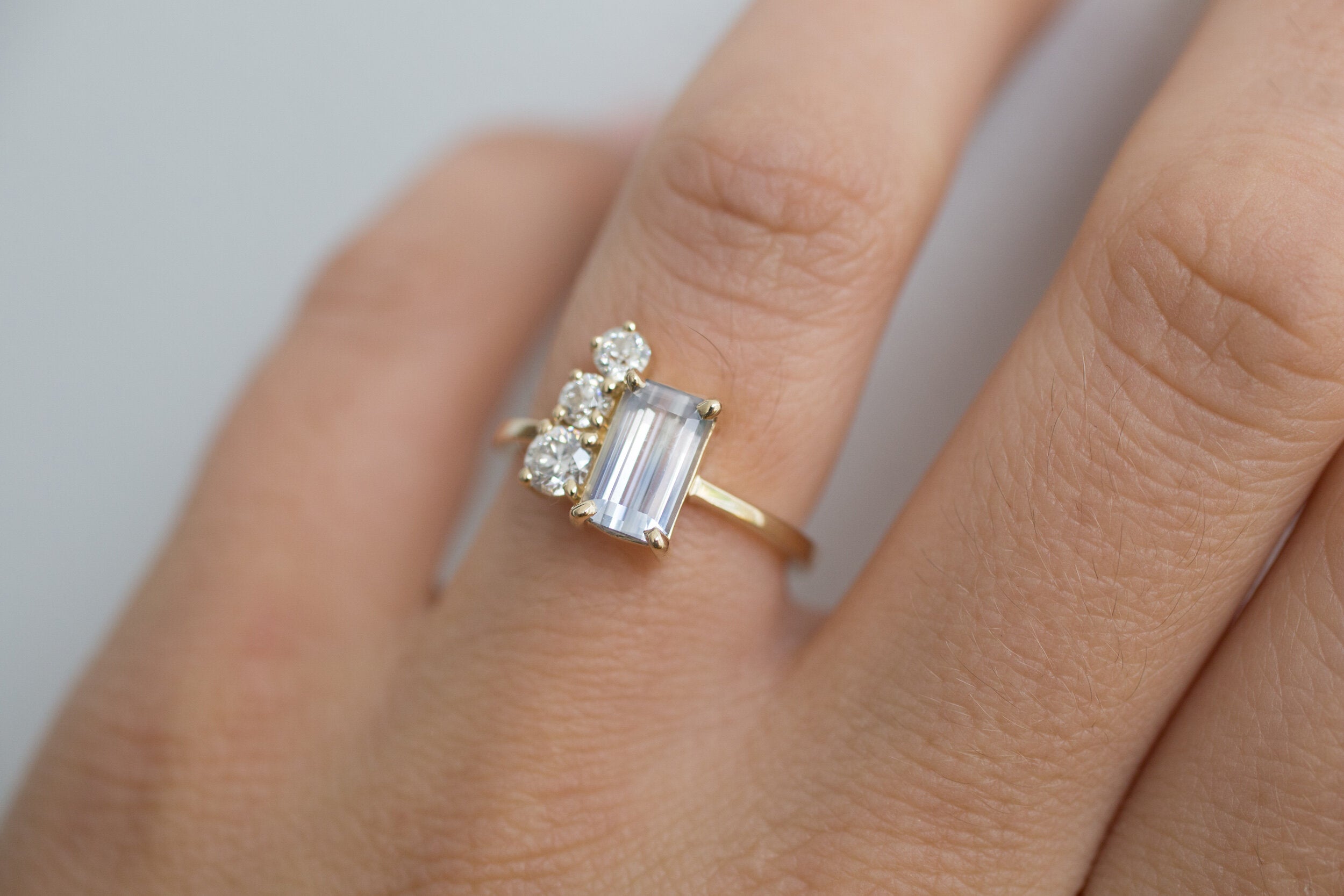 Adra Ring | Bicolor Bluish White Emerald Cut Sapphire + Old European Cut Diamond Cluster Engagement Ring | 14k Recycled Gold | One of a Kind