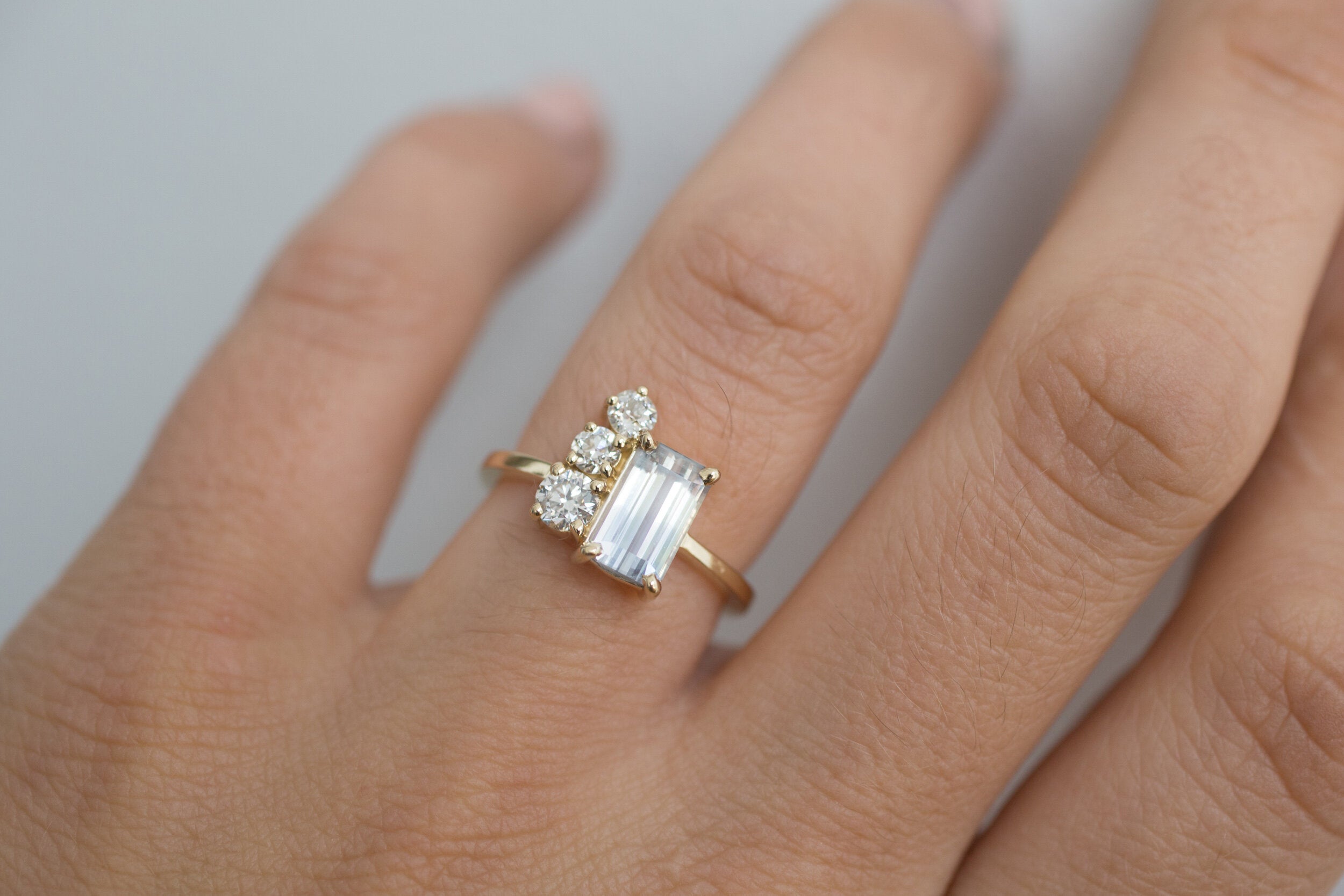 Adra Ring | Bicolor Bluish White Emerald Cut Sapphire + Old European Cut Diamond Cluster Engagement Ring | 14k Recycled Gold | One of a Kind