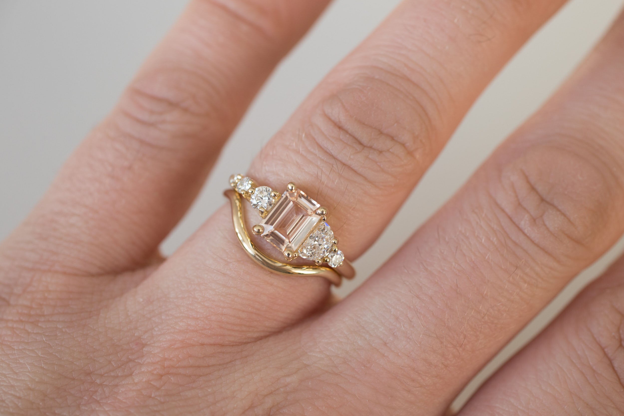 Sarine Ring | Blush Apricot Sapphire + Half Moon Diamond + Diamond Cluster Engagement Ring | 14k Recycled Gold | One of a Kind