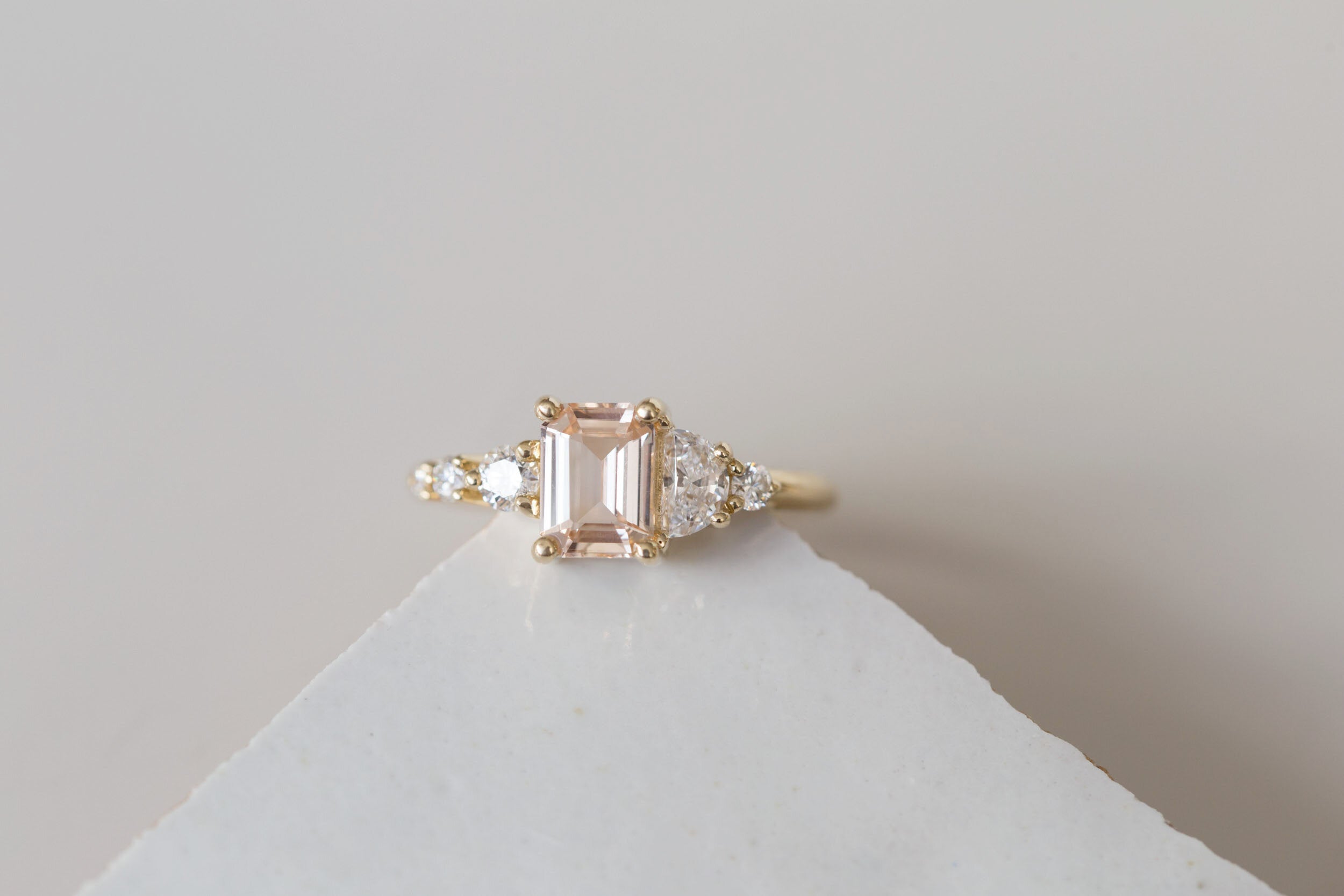 Sarine Ring | Blush Apricot Sapphire + Half Moon Diamond + Diamond Cluster Engagement Ring | 14k Recycled Gold | One of a Kind