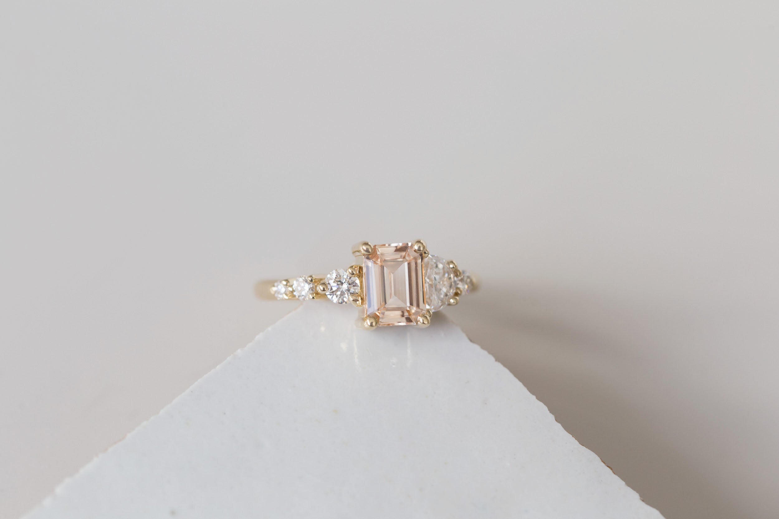 Sarine Ring | Blush Apricot Sapphire + Half Moon Diamond + Diamond Cluster Engagement Ring | 14k Recycled Gold | One of a Kind