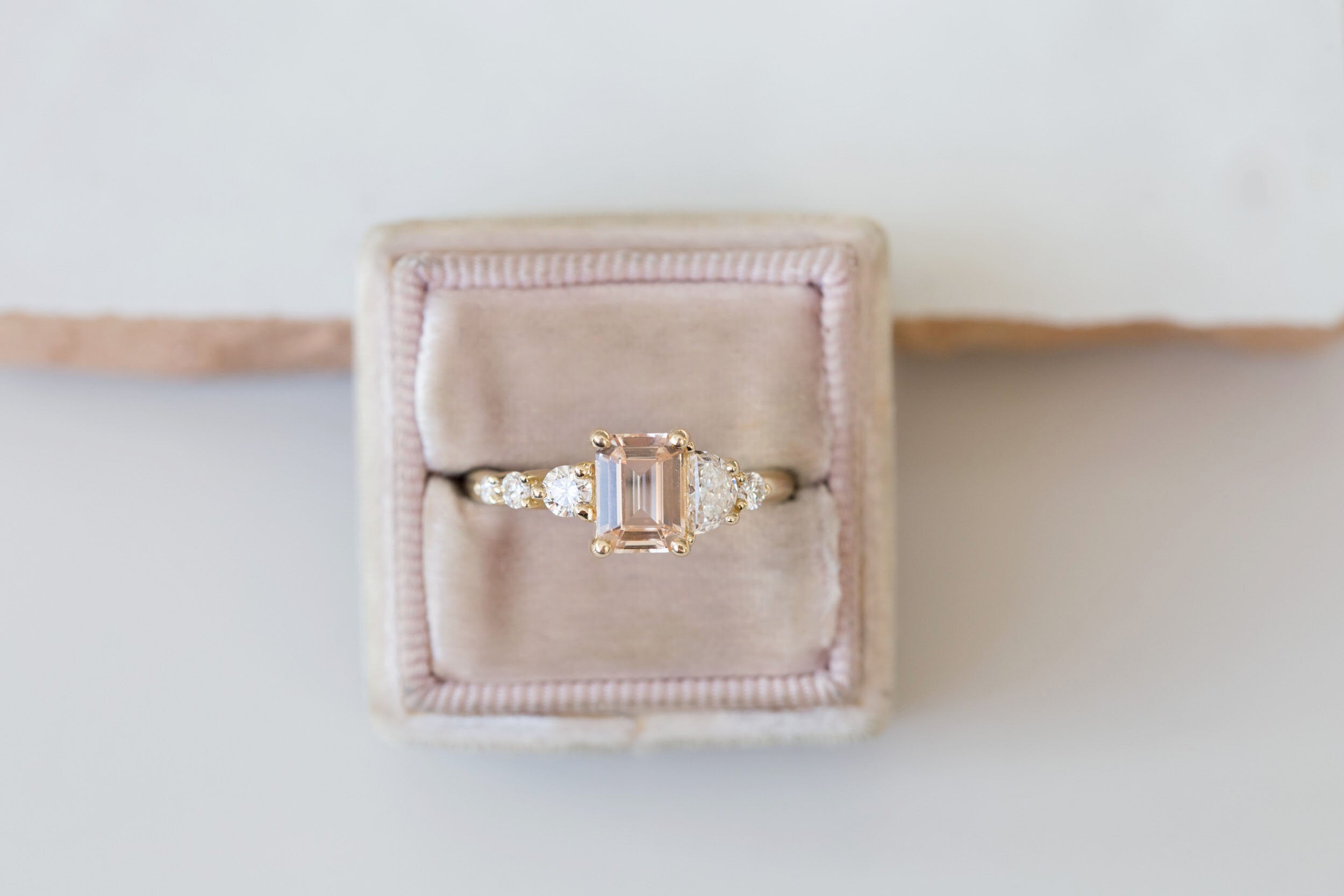 Sarine Ring | Blush Apricot Sapphire + Half Moon Diamond + Diamond Cluster Engagement Ring | 14k Recycled Gold | One of a Kind