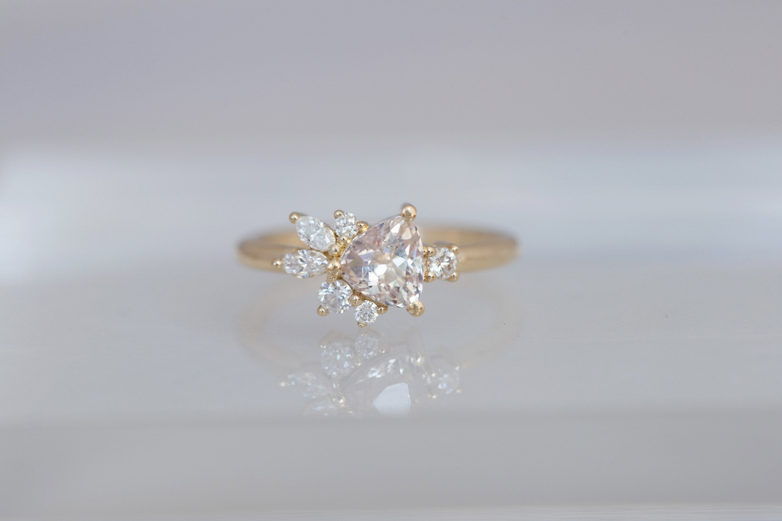 Alden Ring | Blush Sapphire Trillion + Diamond Cluster Engagement Ring 1.13 ct | 14k Recycled Gold | One of a Kind