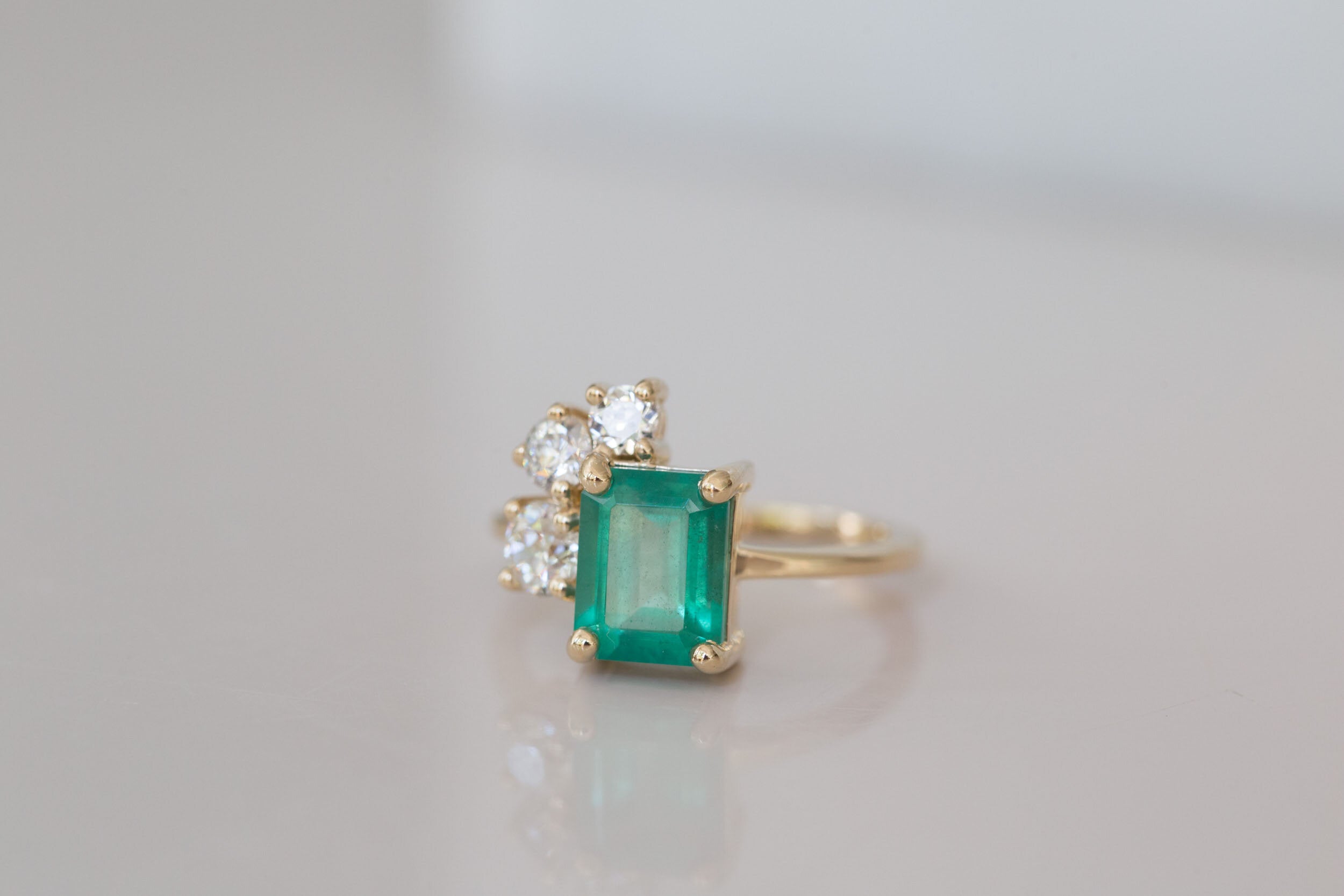 Adra Ring | Emerald + Old European Cut Diamond Cluster Engagement Ring | 14k Recycled Gold | One of a Kind