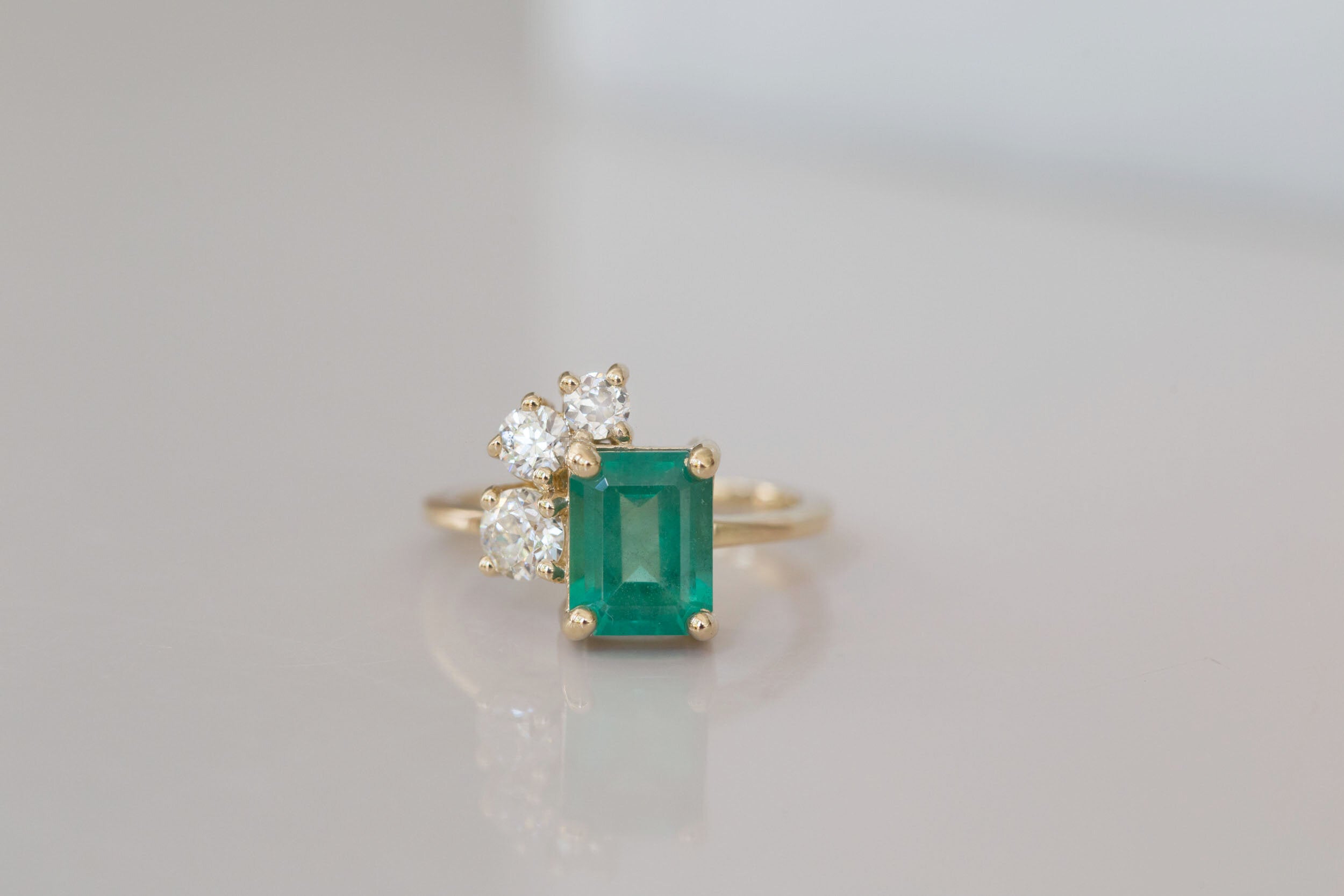 Adra Ring | Emerald + Old European Cut Diamond Cluster Engagement Ring | 14k Recycled Gold | One of a Kind